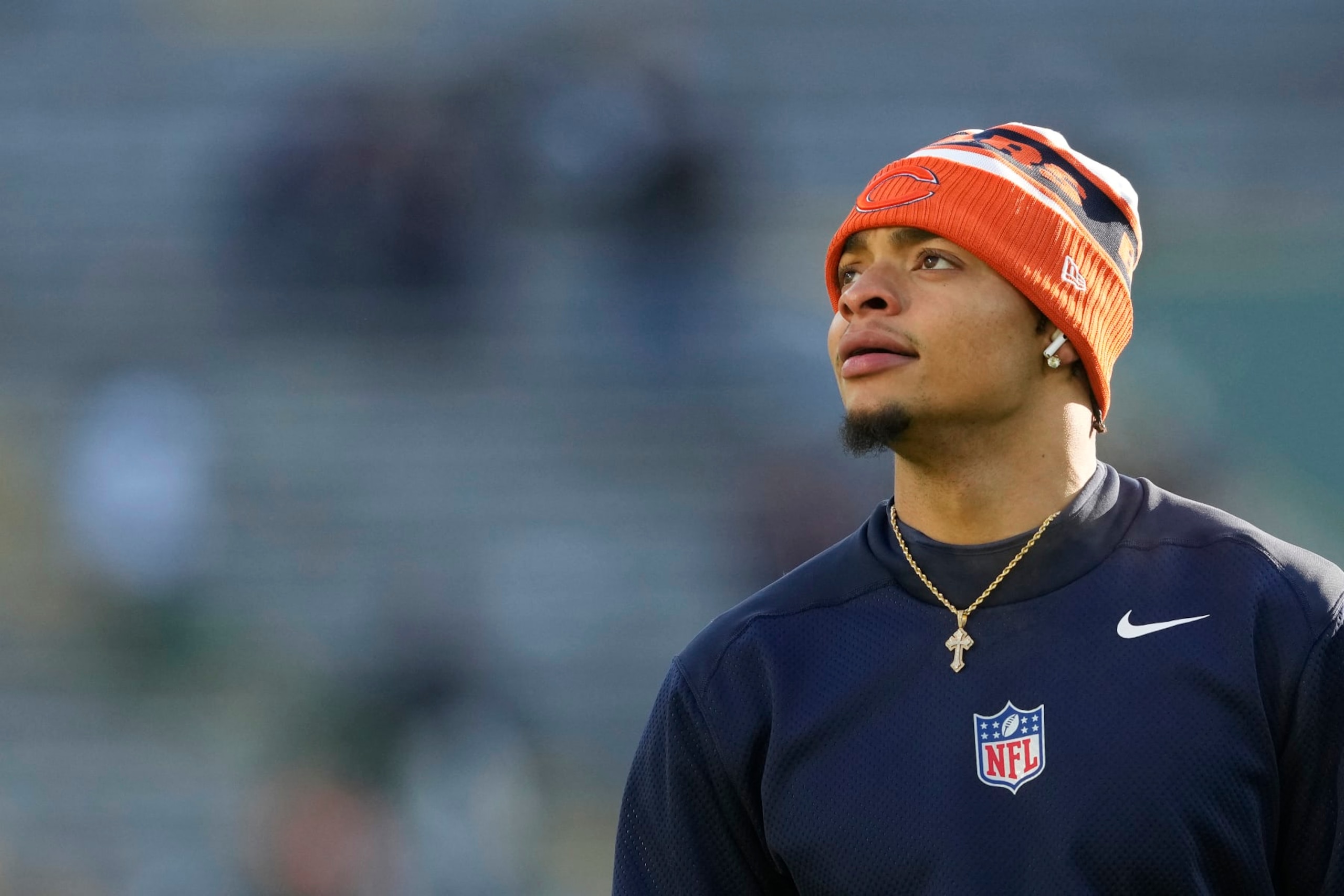 GREEN BAY, WISCONSIN - JANUARY 07: Justin Fields #1 of the Chicago Bears warms up before a game against the Green Bay Packers at Lambeau Field on January 07, 2024 in Green Bay, Wisconsin. (Photo by Patrick McDermott/Getty Images)
