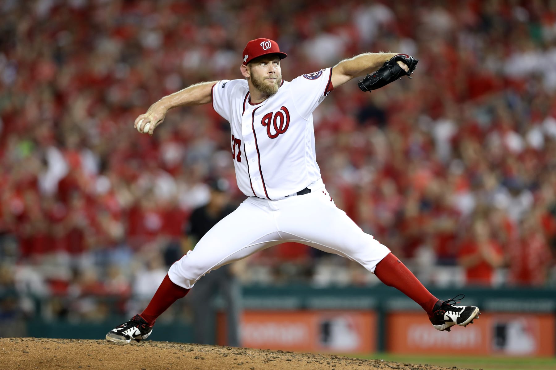 WASHINGTON, DC - OCTOBER 01: Stephen Strasburg #37 of the Washington Nationals throws a pitch against the Milwaukee Brewers during the sixth inning in the National League Wild Card game at Nationals Park on October 01, 2019 in Washington, DC. (Photo by Rob Carr/Getty Images)