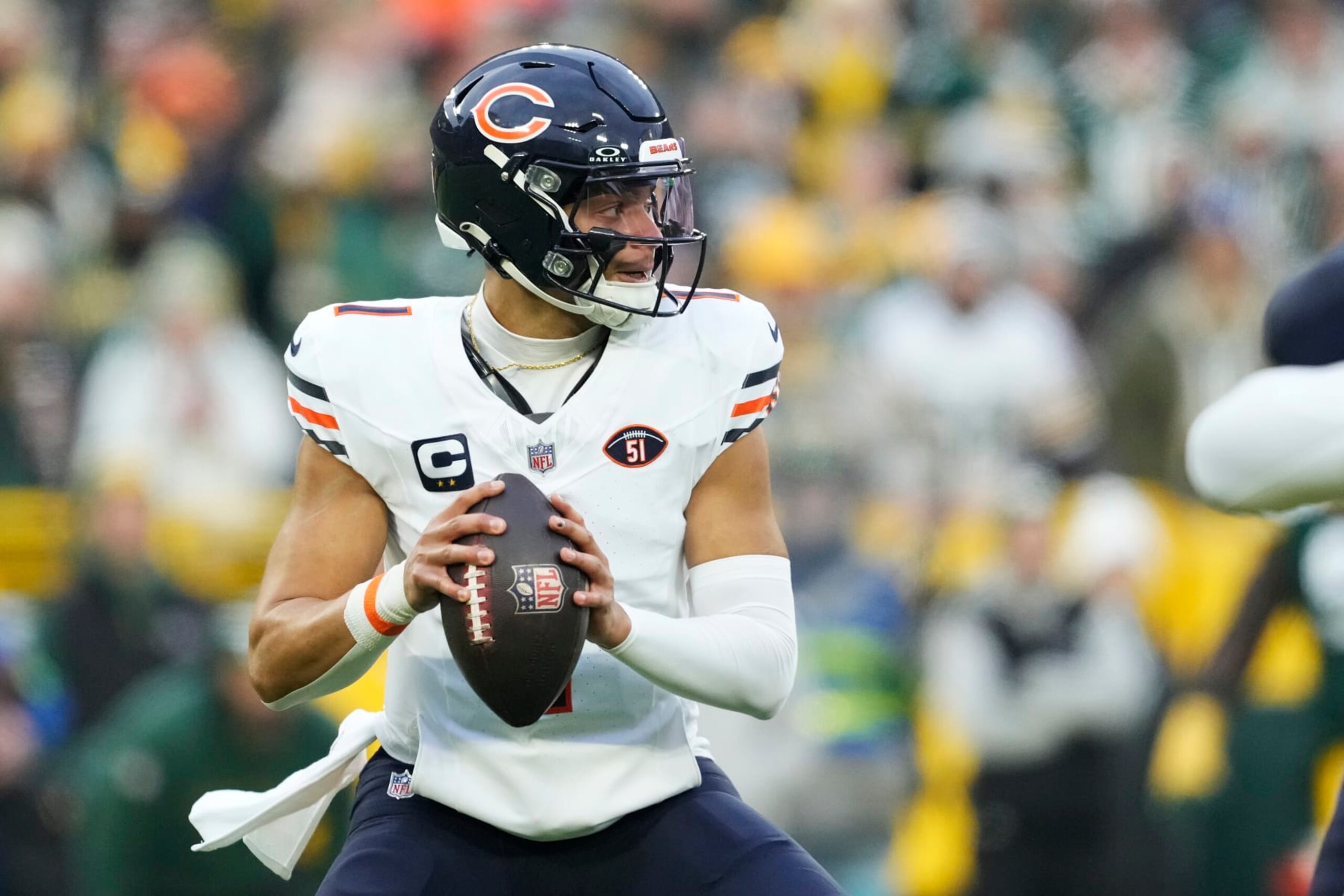 GREEN BAY, WISCONSIN - JANUARY 07: Justin Fields #1 of the Chicago Bears looks to throw a pass in the first half against the Green Bay Packers at Lambeau Field on January 07, 2024 in Green Bay, Wisconsin. (Photo by Patrick McDermott/Getty Images) GREEN BAY, WISCONSIN - JANUARY 07: Justin Fields #1 of the Chicago Bears looks to throw a pass in the first half against the Green Bay Packers at Lambeau Field on January 07, 2024 in Green Bay, Wisconsin. (Photo by Patrick McDermott/Getty Images)