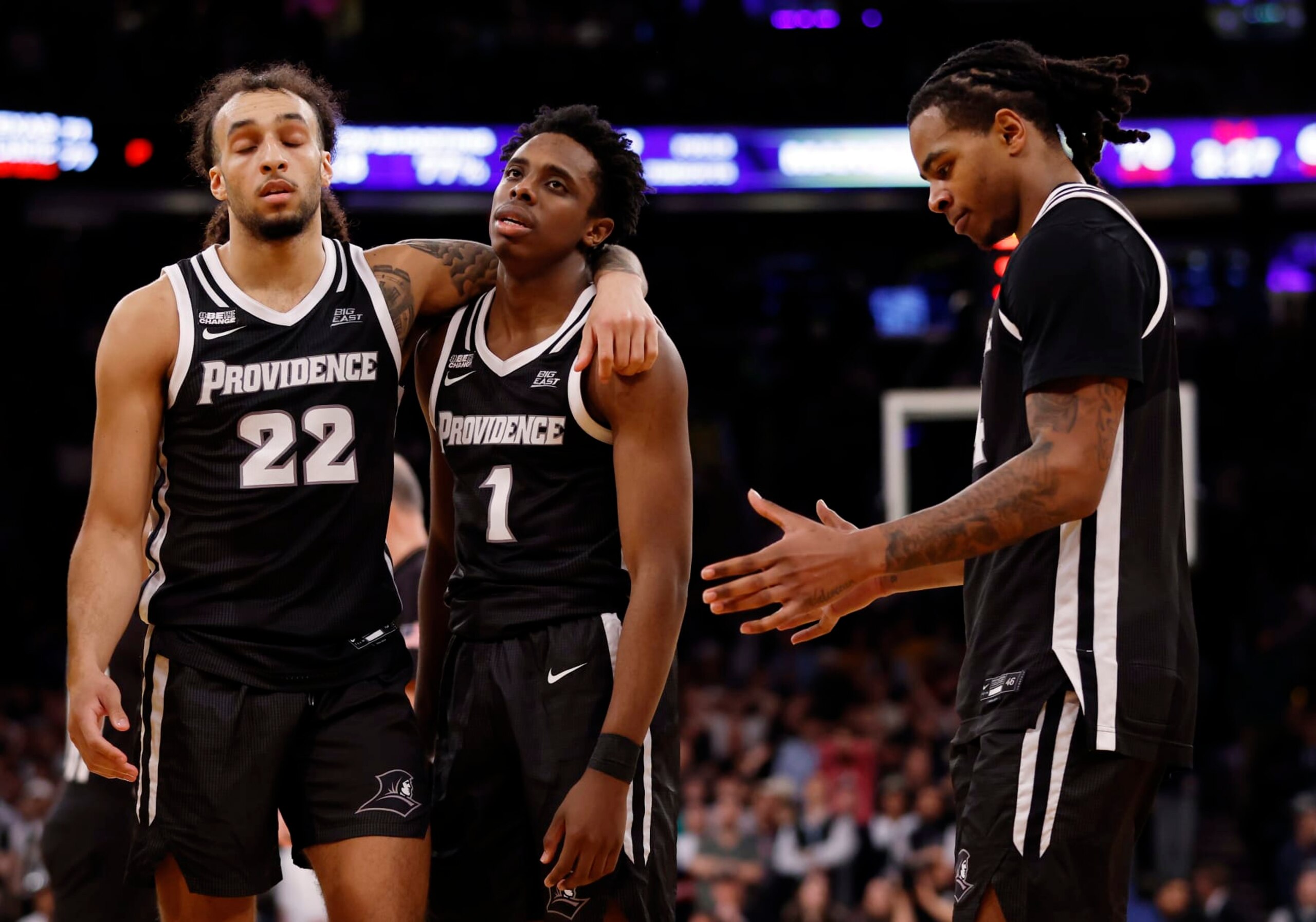 NEW YORK, NEW YORK - MARCH 15: Devin Carter #22, Jayden Pierre #1, and Corey Floyd Jr. #14 of the Providence Friars react in the second half against the Marquette Golden Eagles during the Semifinal round of the Big East Basketball Tournament at Madison Square Garden on March 15, 2024 in New York City. Marquette won 79-68. (Photo by Sarah Stier/Getty Images)