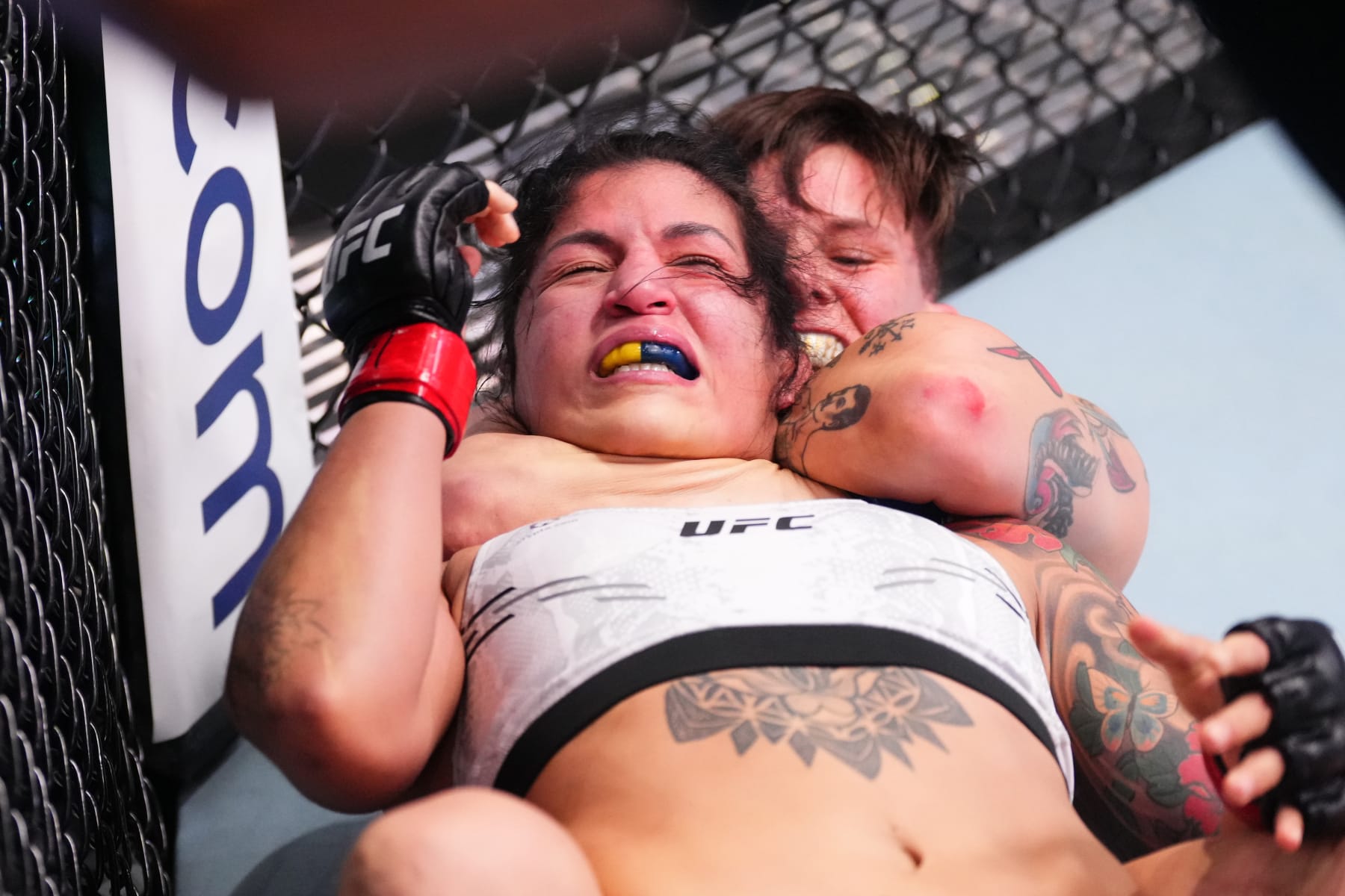 LAS VEGAS, NEVADA - MARCH 16: (R-L) Macy Chiasson submits Pannie Kianzad of Iran in their women's bantamweight fight during the UFC Fight Night event at UFC APEX on March 16, 2024 in Las Vegas, Nevada. (Photo by Jeff Bottari/Zuffa LLC via Getty Images)