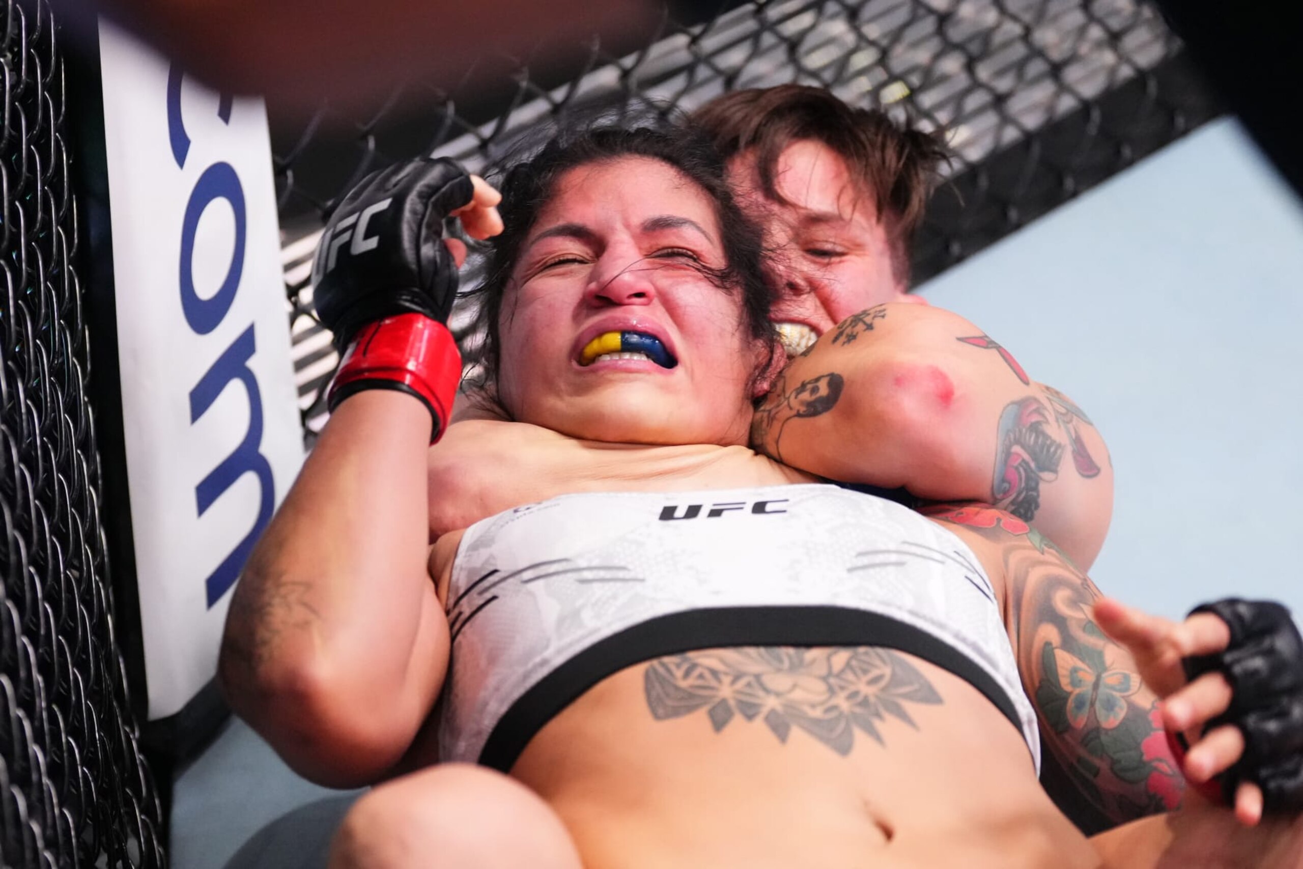 LAS VEGAS, NEVADA - MARCH 16: (R-L) Macy Chiasson submits Pannie Kianzad of Iran in their women's bantamweight fight during the UFC Fight Night event at UFC APEX on March 16, 2024 in Las Vegas, Nevada. (Photo by Jeff Bottari/Zuffa LLC via Getty Images)