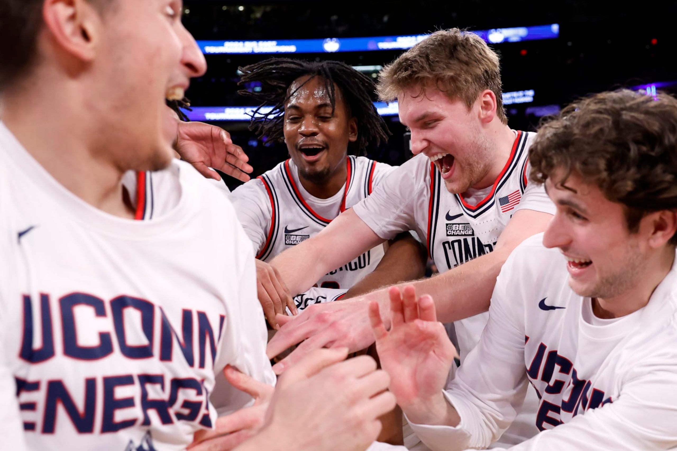 NEW YORK, NEW YORK - MARCH 16: The Connecticut Huskies celebrate after the second half against the Marquette Golden Eagles during the Big East Basketball Tournament Final at Madison Square Garden on March 16, 2024 in New York City. The Huskies won 73-57. (Photo by Sarah Stier/Getty Images)