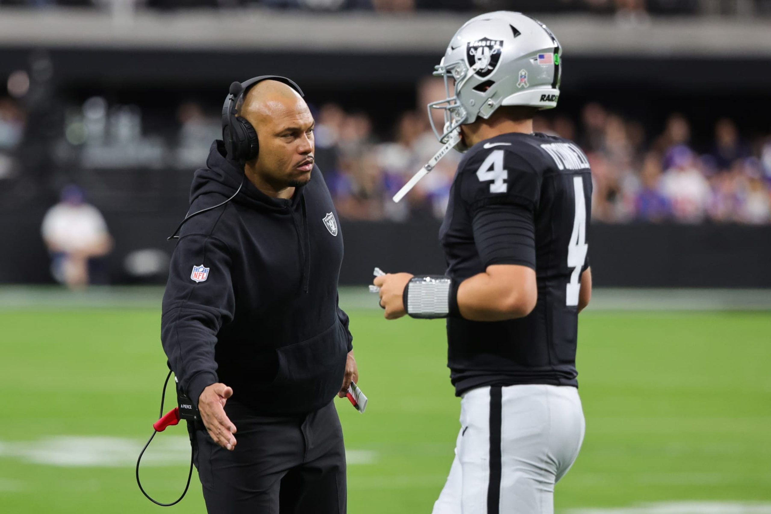 Raiders head coach Antonio Pierce (left) and quarterback Aidan O'Connell (right)