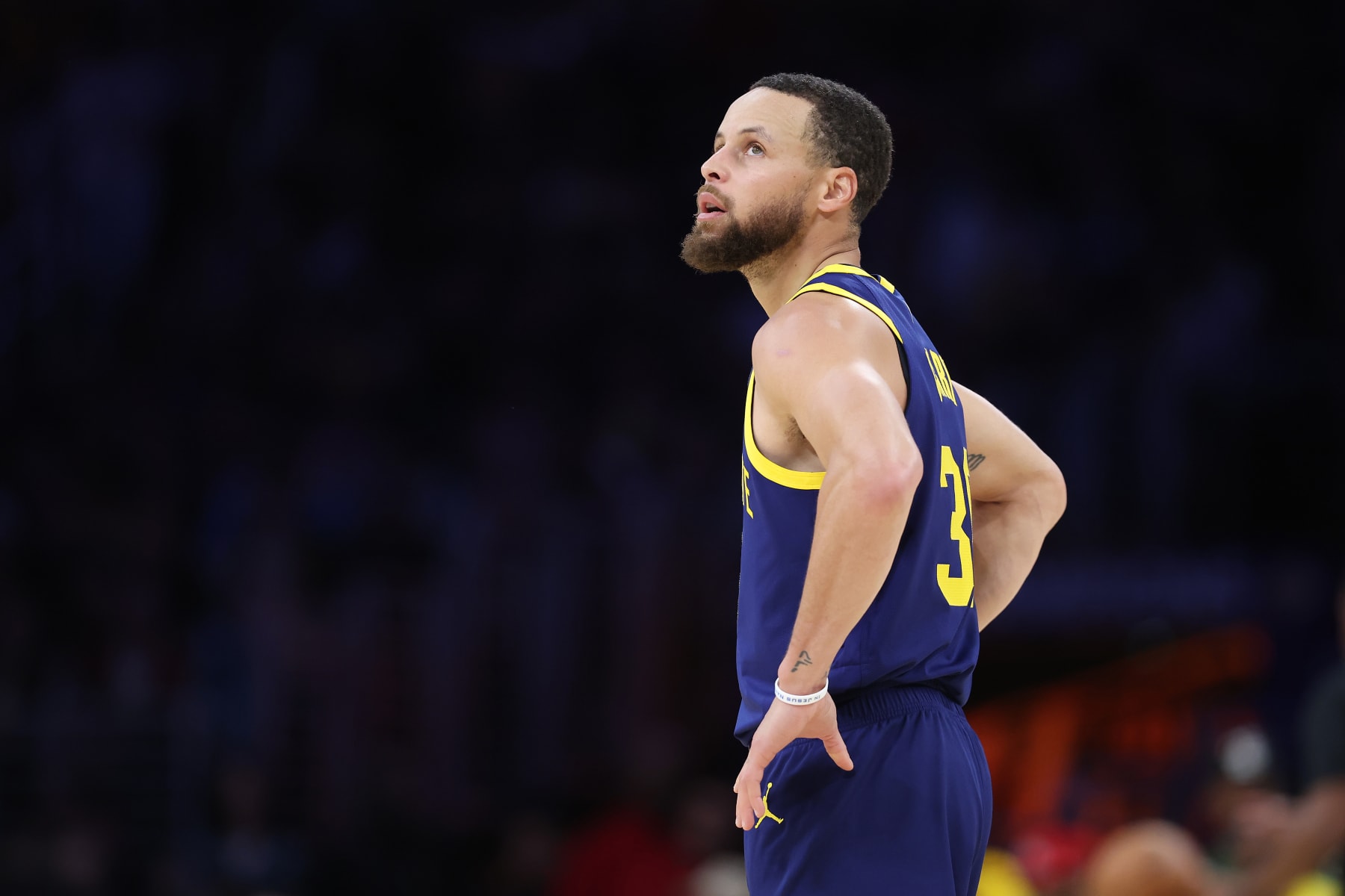 LOS ANGELES, CALIFORNIA - MARCH 16: Stephen Curry #30 of the Golden State Warriors looks on during the first half of a game against the Los Angeles Lakers at Crypto.com Arena on March 16, 2024 in Los Angeles, California. NOTE TO USER: User expressly acknowledges and agrees that, by downloading and or using this photograph, User is consenting to the terms and conditions of the Getty Images License Agreement. (Photo by Sean M. Haffey/Getty Images)