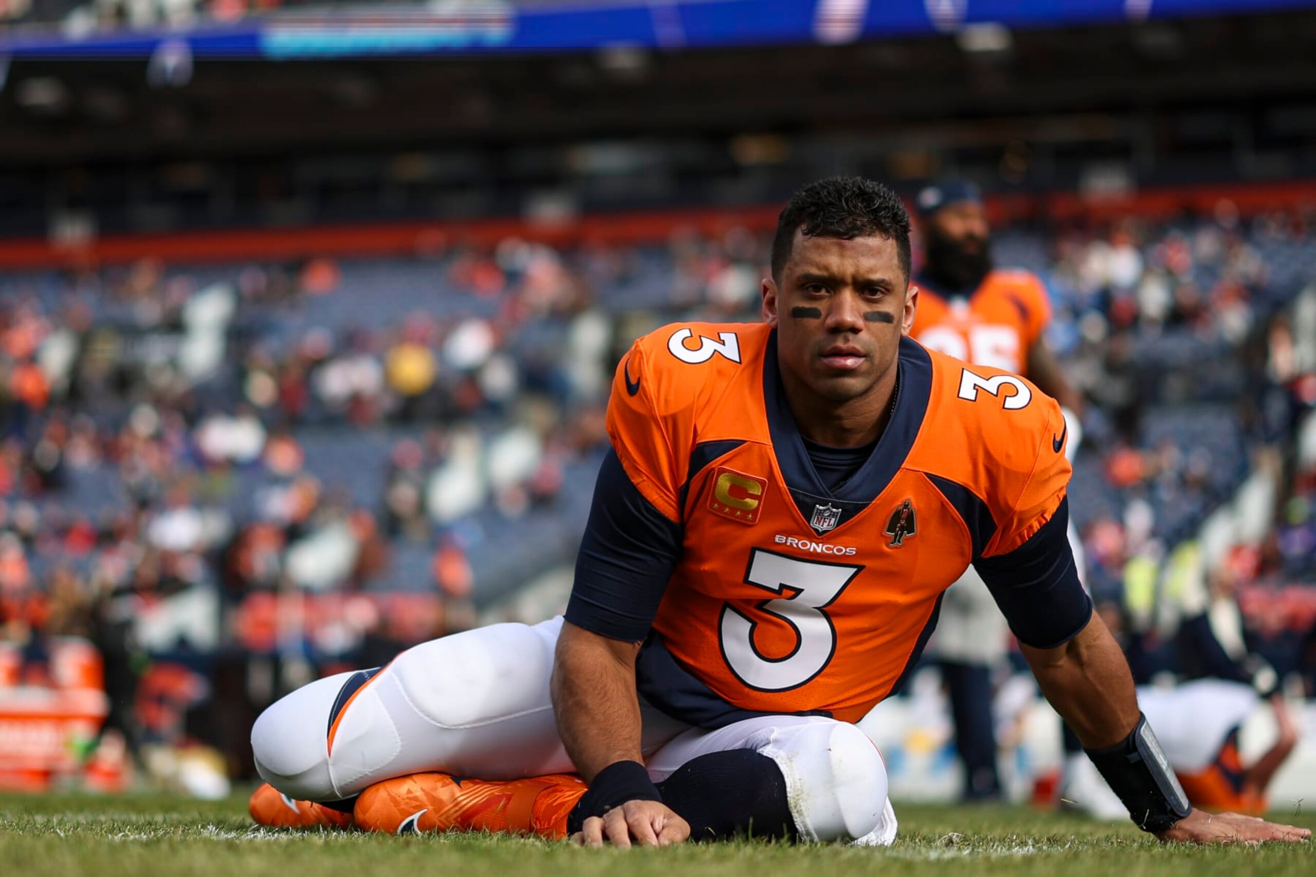 DENVER, CO - DECEMBER 31: Russell Wilson #3 of the Denver Broncos warms up prior to an NFL football game against the Los Angeles Chargers at Empower Field at Mile High on December 31, 2023 in Denver, Colorado. (Photo by Perry Knotts/Getty Images)
