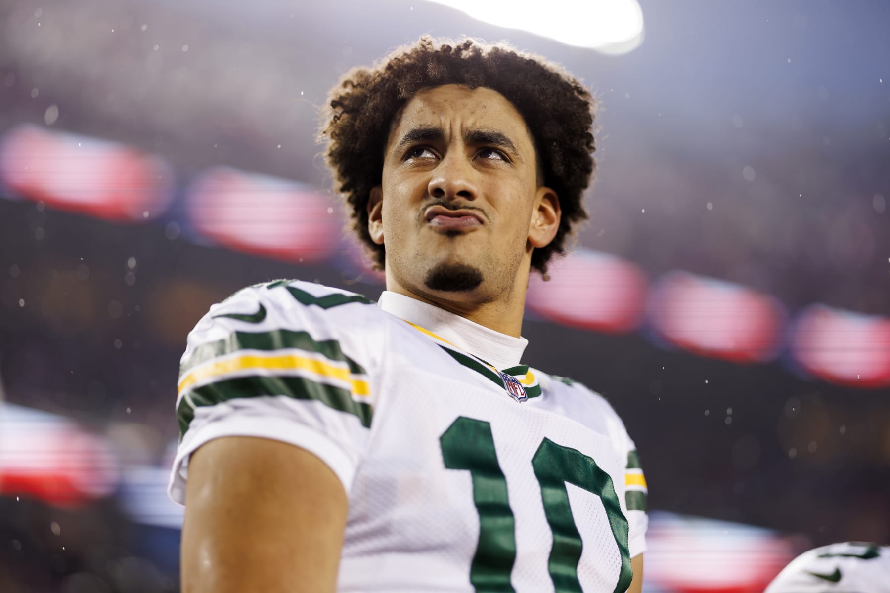 SANTA CLARA, CALIFORNIA - JANUARY 20: Jordan Love #10 of the Green Bay Packers looks on from the sideline before an NFC divisional round playoff football game against the San Francisco 49ers at Levi's Stadium on January 20, 2024 in Santa Clara, California. (Photo by Ryan Kang/Getty Images)