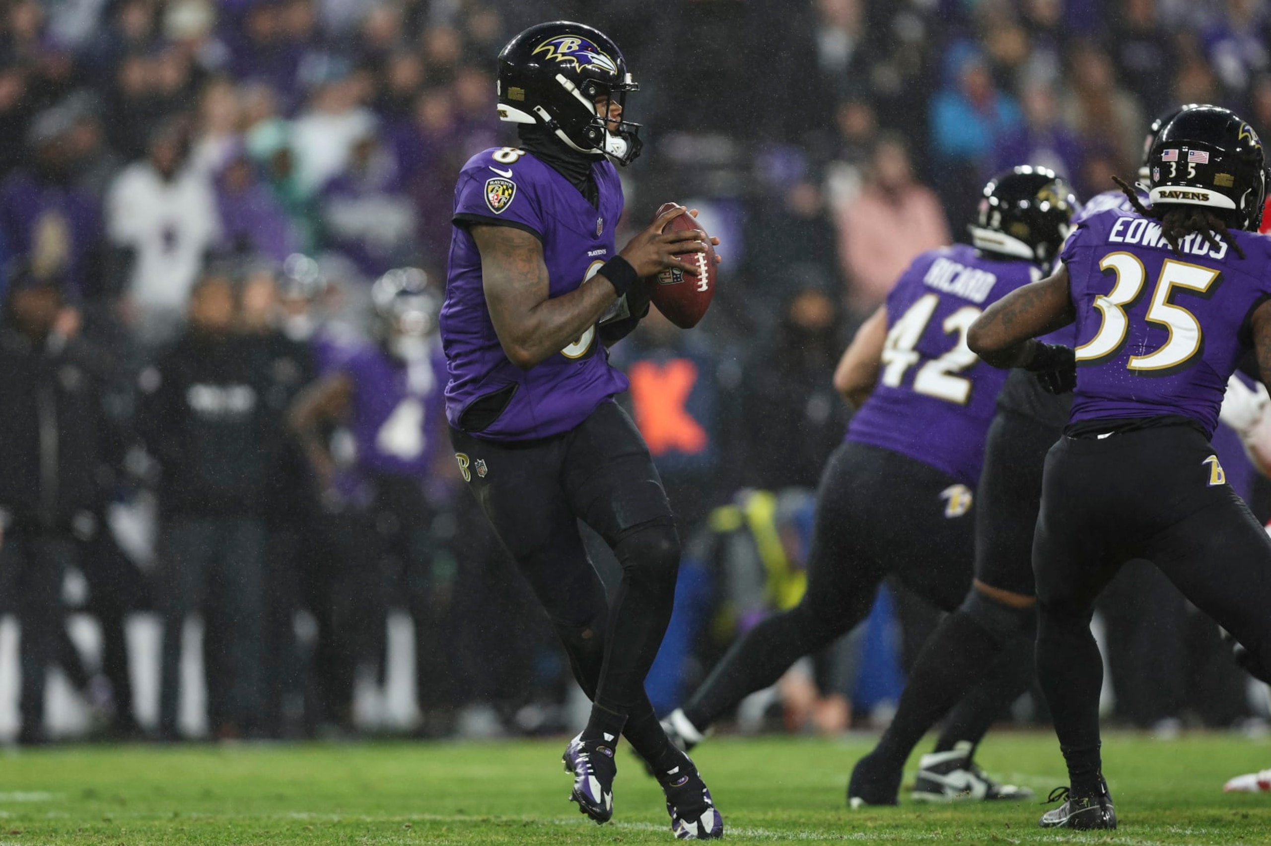 BALTIMORE, MD - JANUARY 28: Lamar Jackson #8 of the Baltimore Ravens drops back to pass during the AFC Championship NFL football game against the Kansas City Chiefs at M&T Bank Stadium on January 28, 2024 in Baltimore, Maryland. (Photo by Perry Knotts/Getty Images)
