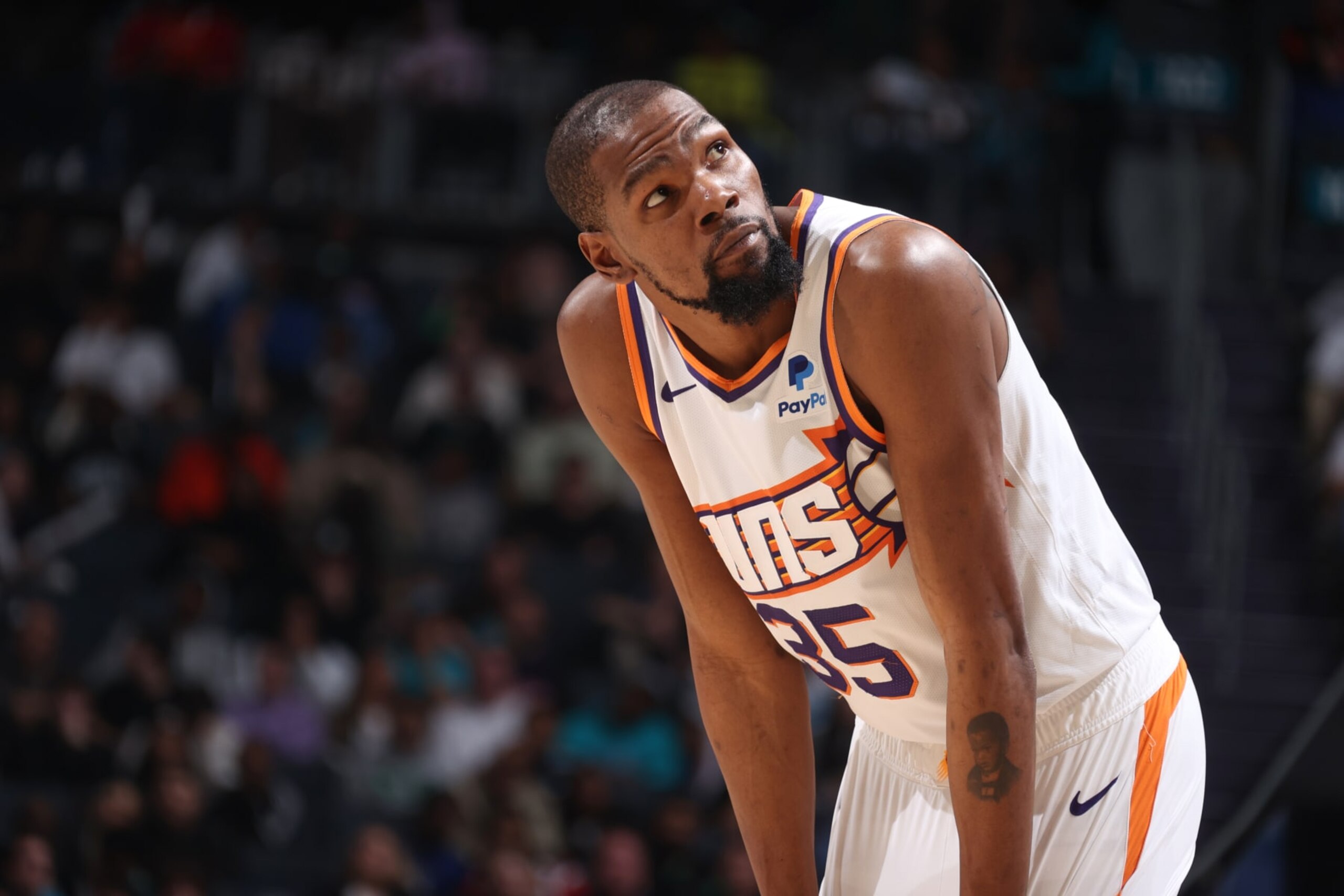 CHARLOTTE, NC - MARCH 15:  Kevin Durant #35 of the Phoenix Suns looks on during the game on March 15, 2024 at Spectrum Center in Charlotte, North Carolina. NOTE TO USER: User expressly acknowledges and agrees that, by downloading and or using this photograph, User is consenting to the terms and conditions of the Getty Images License Agreement.  Mandatory Copyright Notice:  Copyright 2024 NBAE (Photo by Nathaniel S. Butler/NBAE via Getty Images)