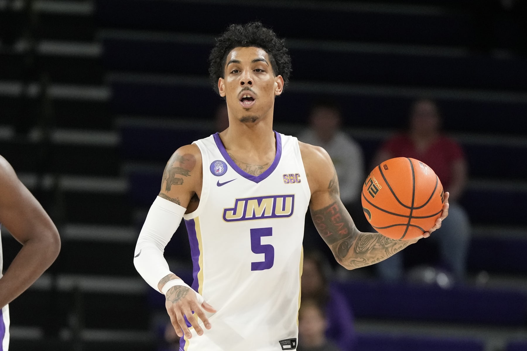 HARRISONBURG, VA - JANUARY 11:  Terrence Edwards Jr. #5 of the James Madison Dukes dribbles the ball during a college basketball game against the South Alabama Jaguars at the Atlantic Union Bank Center on January 11, 2024 in Harrisonburg, Virginia.  (Photo by Mitchell Layton/Getty Images)
