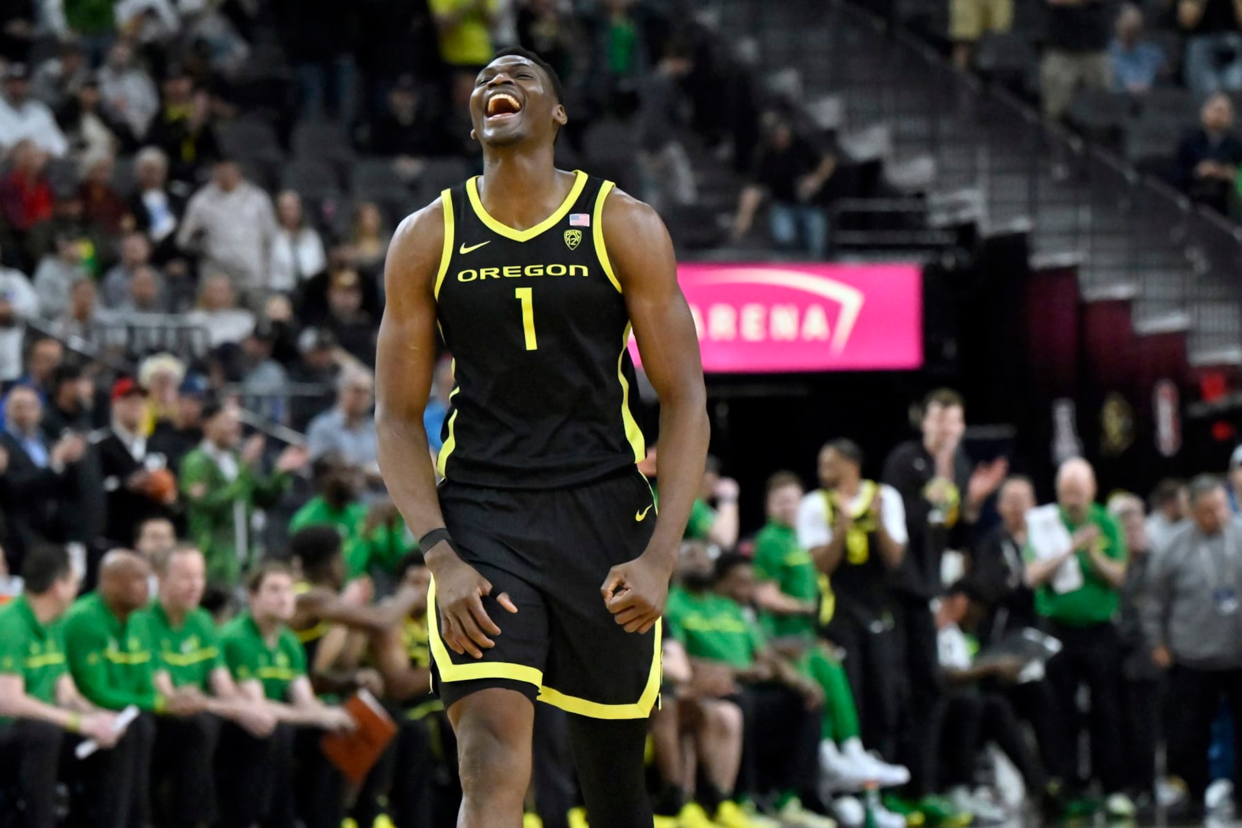 LAS VEGAS, NEVADA - MARCH 16: N'Faly Dante #1 of the Oregon Ducks reacts as he anticipates victory over the Colorado Buffaloes in the second half of the championship game in the Pac-12 basketball tournament at T-Mobile Arena on March 16, 2024 in Las Vegas, Nevada. The Ducks defeated the Buffaloes 75-68. (Photo by David Becker/Getty Images) LAS VEGAS, NEVADA - MARCH 16: N'Faly Dante #1 of the Oregon Ducks reacts as he anticipates victory over the Colorado Buffaloes in the second half of the championship game in the Pac-12 basketball tournament at T-Mobile Arena on March 16, 2024 in Las Vegas, Nevada. The Ducks defeated the Buffaloes 75-68. (Photo by David Becker/Getty Images)