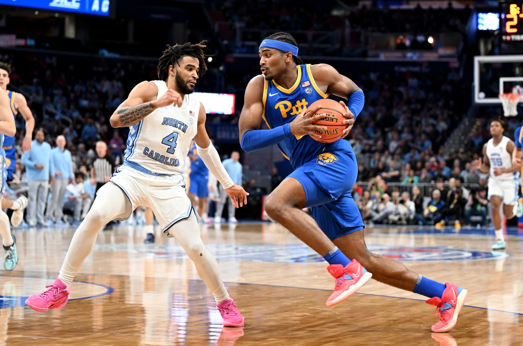 WASHINGTON, DC - MARCH 15: Blake Hinson #2 of the Pittsburgh Panthers handles the ball in the second half against RJ Davis #4 of the North Carolina Tar Heels in the Semifinals of the ACC Men's Basketball Tournament  at Capital One Arena on March 15, 2024 in Washington, DC.  (Photo by Greg Fiume/Getty Images)