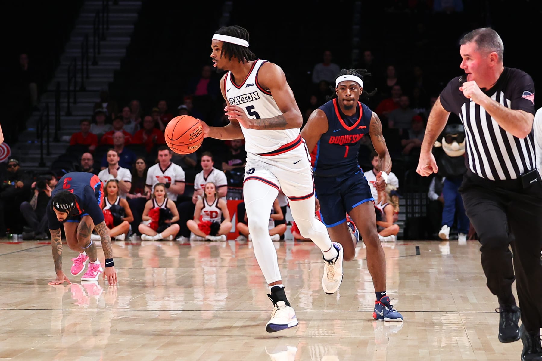 BROOKLYN, NY - MARCH 14: DaRon Holmes II #15 of the Dayton Flyers brings the ball upcourt during the first half of the Atlantic 10 Championship tournament game against the Duquesne Dukes on March 14, 2024 at Barclays Center in Brooklyn, New York.  (Photo by Rich Graessle/Icon Sportswire via Getty Images)