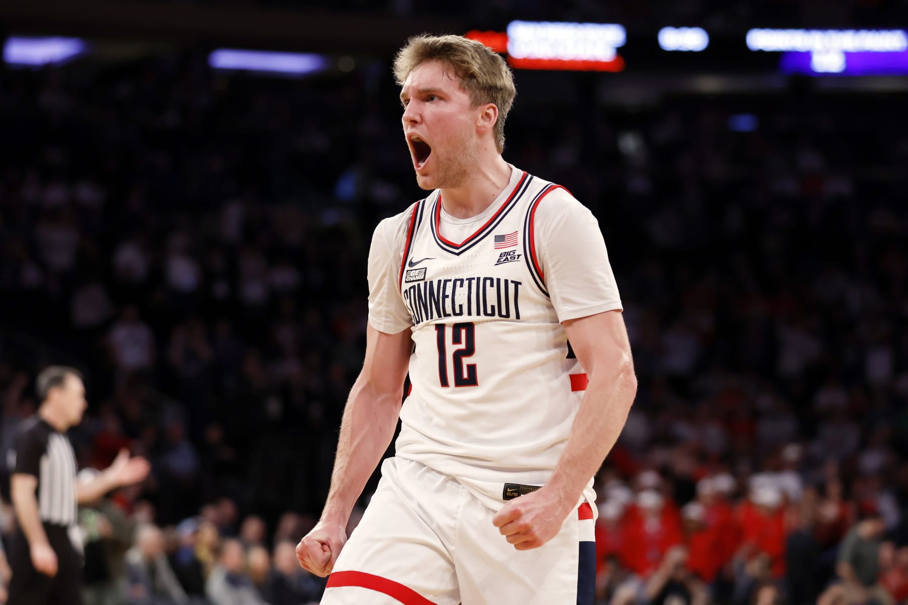 NEW YORK, NEW YORK - MARCH 15: Cam Spencer #12 of the Connecticut Huskies reacts in the first half against the St. John's Red Storm during the Semifinal round of the Big East Basketball Tournament at Madison Square Garden on March 15, 2024 in New York City. (Photo by Sarah Stier/Getty Images)