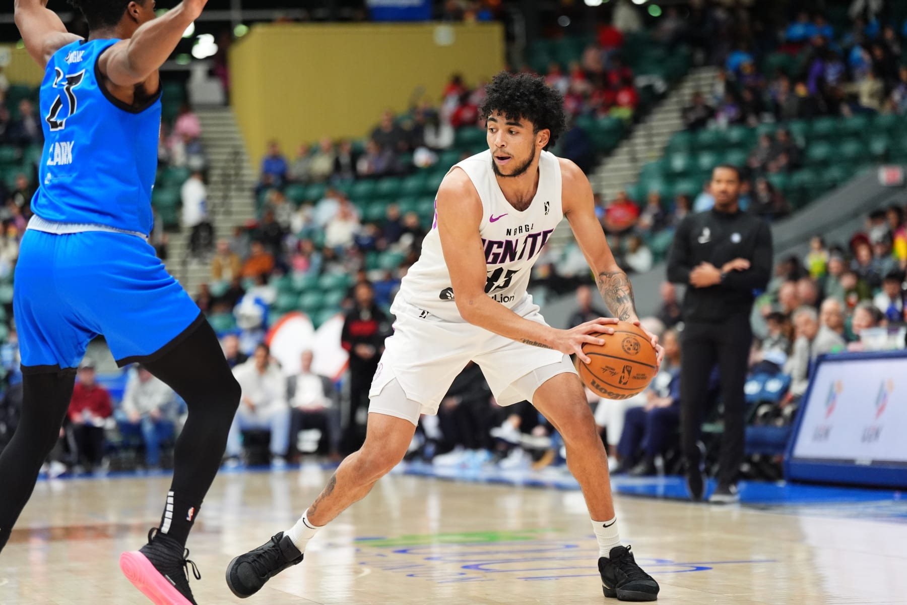 FRISCO, TX - FEBRUARY 28: Izan Almansa #33 of the G League Ignite looks to pass the ball during the game  against the Texas Legends on February 28, 2024 at Comerica Center in Frisco, Texas. NOTE TO USER: User expressly acknowledges and agrees that, by downloading and or using this photograph, User is consenting to the terms and conditions of the Getty Images License Agreement. Mandatory Copyright Notice: Copyright 2023 NBAE (Photo by Cooper Neill/NBAE via Getty Images)