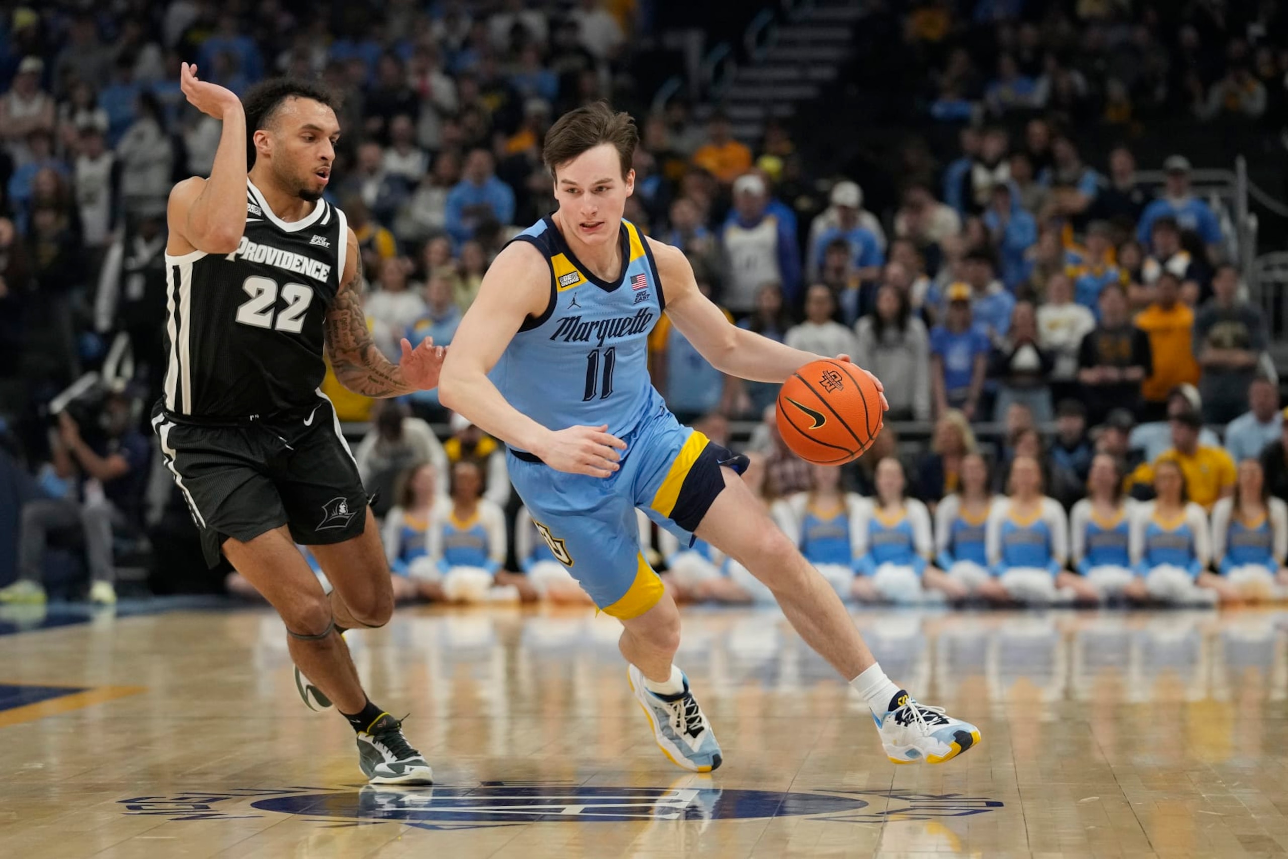 MILWAUKEE, WISCONSIN - FEBRUARY 28: Tyler Kolek #11 of the Marquette Golden Eagles dribbles the ball against Devin Carter #22 of the Providence Friars during the first half at Fiserv Forum on February 28, 2024 in Milwaukee, Wisconsin. (Photo by Patrick McDermott/Getty Images) MILWAUKEE, WISCONSIN - FEBRUARY 28: Tyler Kolek #11 of the Marquette Golden Eagles dribbles the ball against Devin Carter #22 of the Providence Friars during the first half at Fiserv Forum on February 28, 2024 in Milwaukee, Wisconsin. (Photo by Patrick McDermott/Getty Images)
