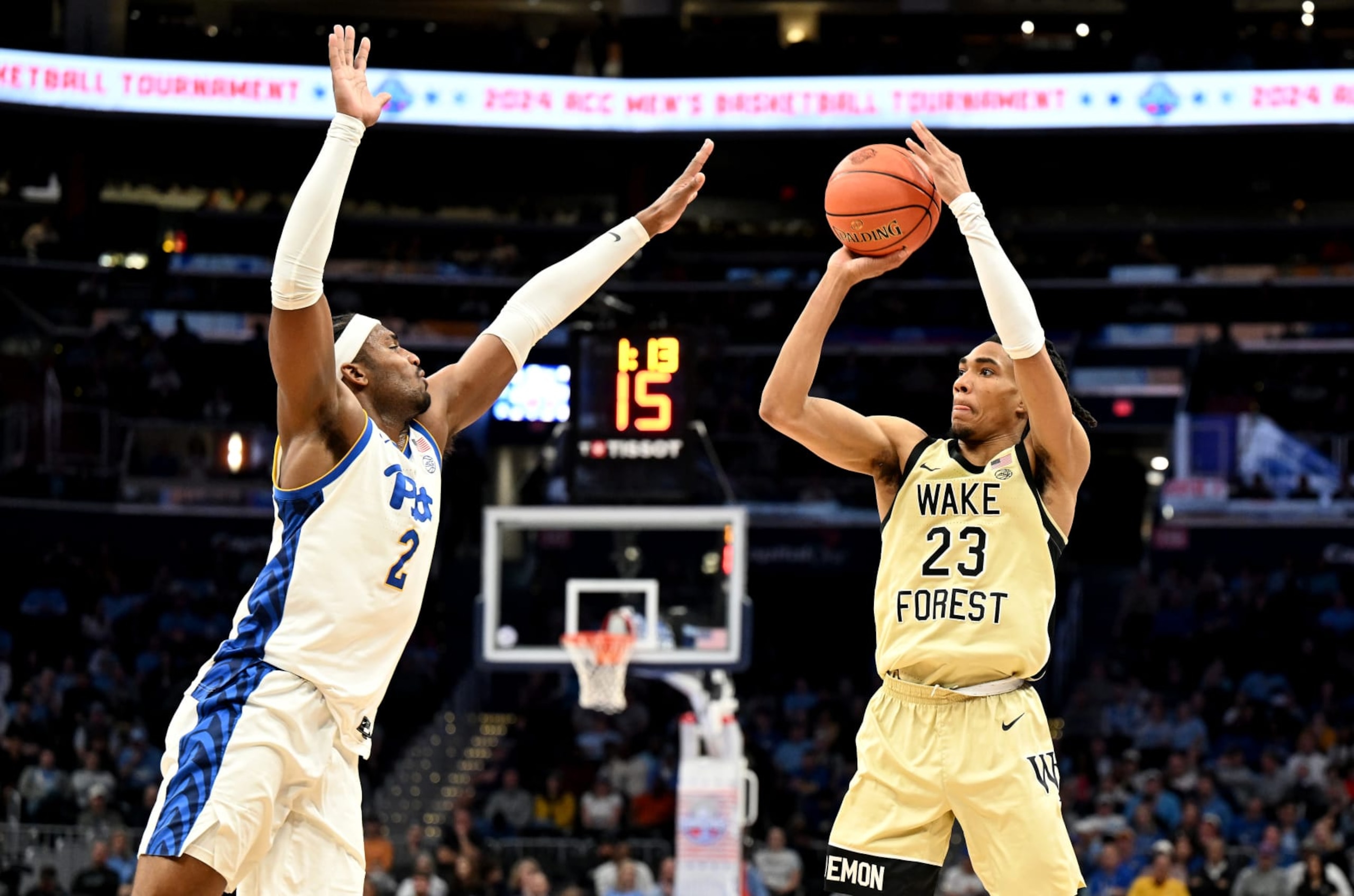 WASHINGTON, DC - MARCH 14: Hunter Sallis #23 of the Wake Forest Demon Deacons shoots the ball in the first half against Blake Hinson #2 of the Pittsburgh Panthers in the Quarterfinals of the ACC Men's Basketball Tournament at Capital One Arena on March 14, 2024 in Washington, DC. (Photo by Greg Fiume/Getty Images) WASHINGTON, DC - MARCH 14: Hunter Sallis #23 of the Wake Forest Demon Deacons shoots the ball in the first half against Blake Hinson #2 of the Pittsburgh Panthers in the Quarterfinals of the ACC Men's Basketball Tournament at Capital One Arena on March 14, 2024 in Washington, DC. (Photo by Greg Fiume/Getty Images)