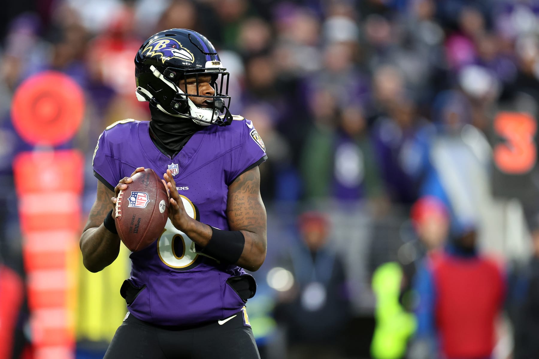 BALTIMORE, MARYLAND - JANUARY 28: Quarterback Lamar Jackson #8 of the Baltimore Ravens drops back to pass against the Kansas City Chiefs in the AFC Championship Game at M&T Bank Stadium on January 28, 2024 in Baltimore, Maryland. (Photo by Rob Carr/Getty Images)