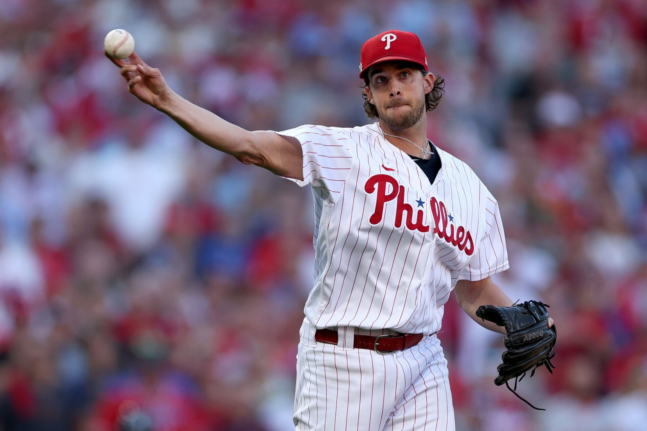 PHILADELPHIA, PENNSYLVANIA - OCTOBER 14: Aaron Nola #27 of the Philadelphia Phillies makes an out to close out the top of the first inning against the Atlanta Braves in game three of the National League Division Series at Citizens Bank Park on October 14, 2022 in Philadelphia, Pennsylvania. (Photo by Patrick Smith/Getty Images)