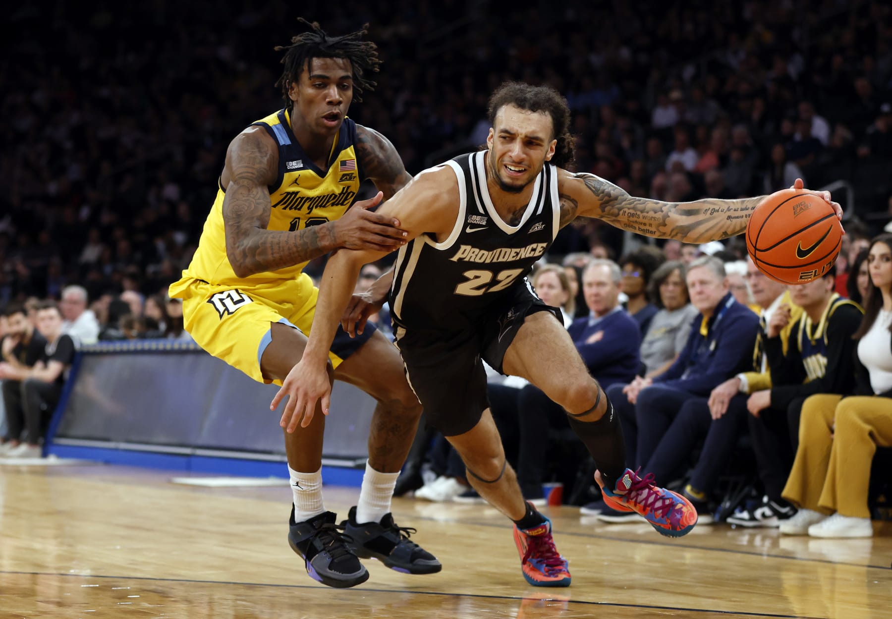 NEW YORK, NEW YORK - MARCH 15: Devin Carter #22 of the Providence Friars dribbles against Zaide Lowery #10 of the Marquette Golden Eagles in the first half during the Semifinal round of the Big East Basketball Tournament at Madison Square Garden on March 15, 2024 in New York City. (Photo by Sarah Stier/Getty Images)