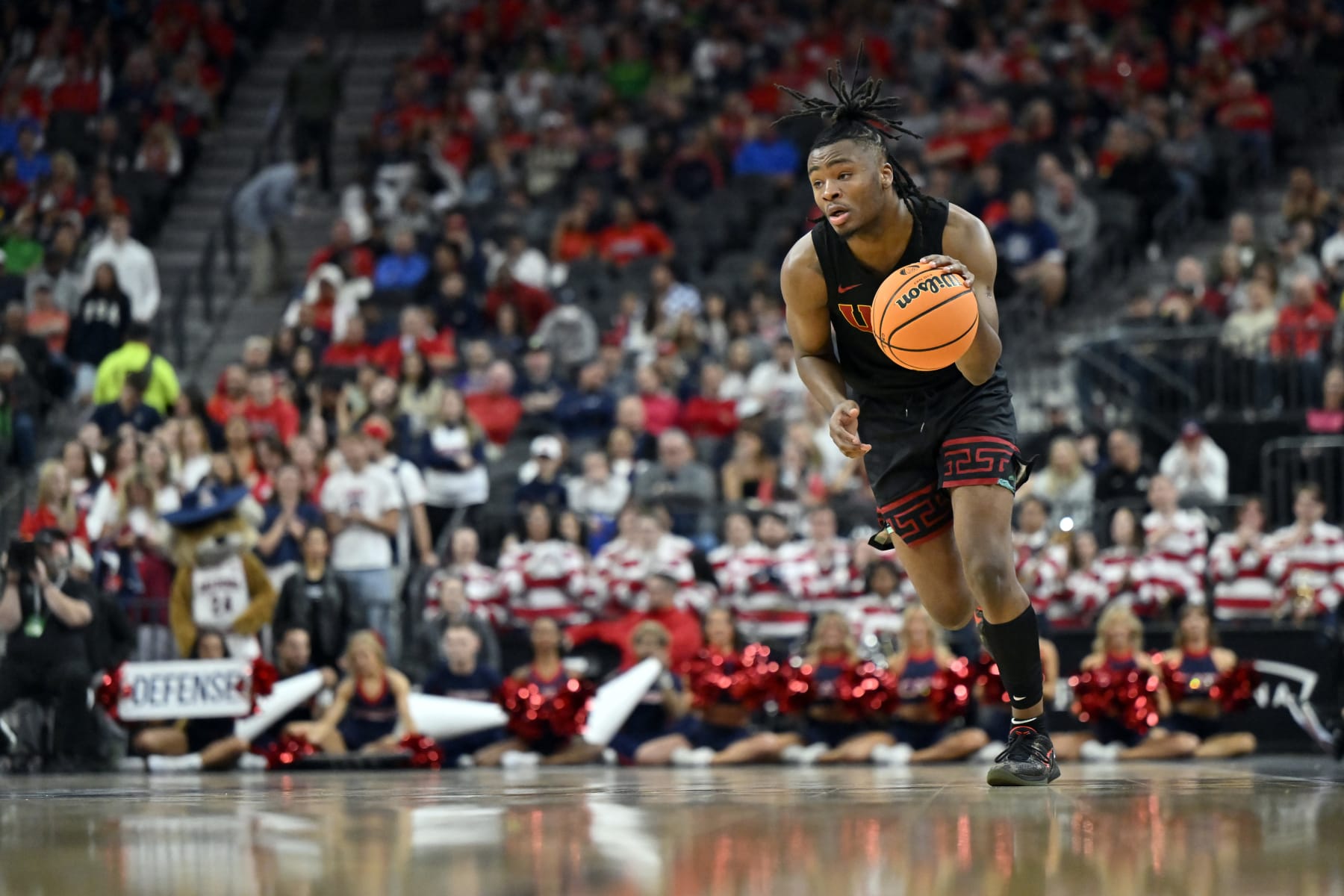 LAS VEGAS, NEVADA - MARCH 14: Isaiah Collier #1 of the USC Trojans brings the ball up court against the Arizona Wildcats in the second half of a quarterfinal game of the Pac-12 Conference basketball tournament at T-Mobile Arena on March 14, 2024 in Las Vegas, Nevada. The Wildcats defeated the Trojans 70-49. (Photo by David Becker/Getty Images)