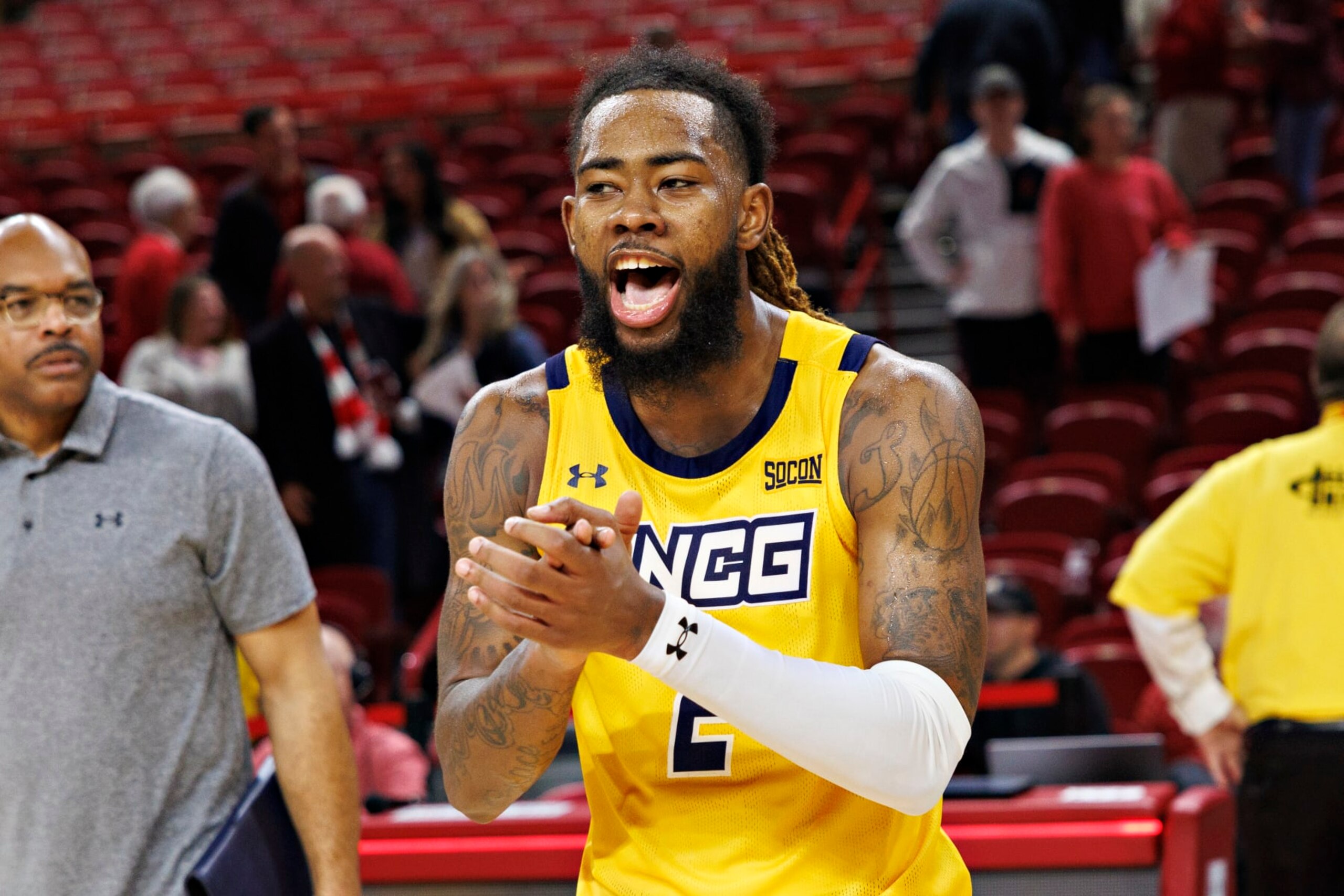 FAYETTEVILLE, ARKANSAS - NOVEMBER 17: Mikeal Brown-Jones #2 of the UNC Greensboro Spartans celebrates the win after the game against the Arkansas Razorbacks at Bud Walton Arena on November 17, 2023 in Fayetteville, Arkansas. The Spartans defeated the Razorbacks 78-72. (Photo by Wesley Hitt/Getty Images) FAYETTEVILLE, ARKANSAS - NOVEMBER 17: Mikeal Brown-Jones #2 of the UNC Greensboro Spartans celebrates the win after the game against the Arkansas Razorbacks at Bud Walton Arena on November 17, 2023 in Fayetteville, Arkansas. The Spartans defeated the Razorbacks 78-72. (Photo by Wesley Hitt/Getty Images)