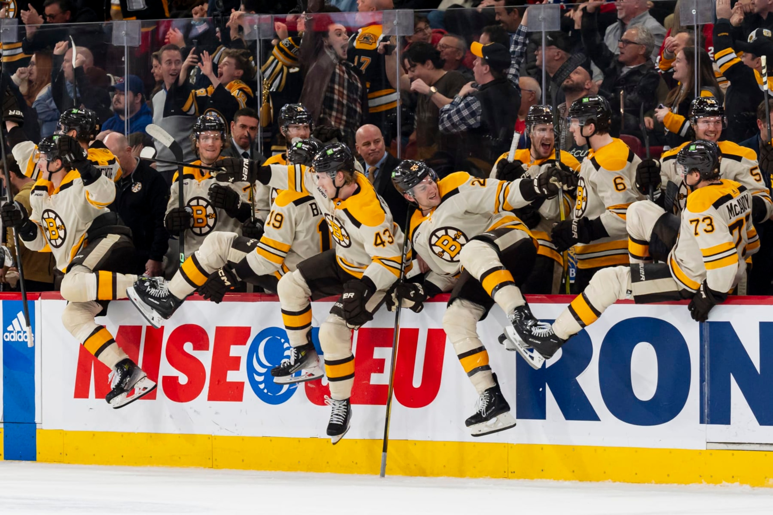 MONTREAL, CANADA - MARCH 14: The Boston Bruins bench clears after a goal was scored by Jake DeBrusk #74 during the overtime period of the NHL regular season game against the Montreal Canadiens at the Bell Centre on March 14, 2024 in Montreal, Quebec, Canada. The Bruins won 2-1 in overtime. (Photo by Arianne Bergeron/NHLI via Getty Images)