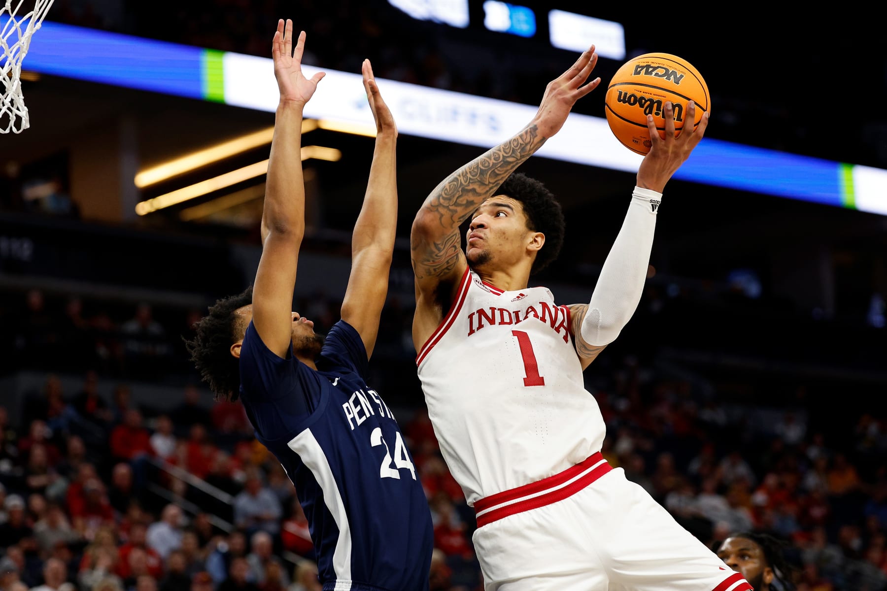 MINNEAPOLIS, MINNESOTA - MARCH 14: Kel'el Ware #1 of the Indiana Hoosiers goes up for a shot against Zach Hicks #24 of the Penn State Nittany Lions in the first half in the Second Round of the Big Ten Tournament at Target Center on March 14, 2024 in Minneapolis, Minnesota. (Photo by David Berding/Getty Images)