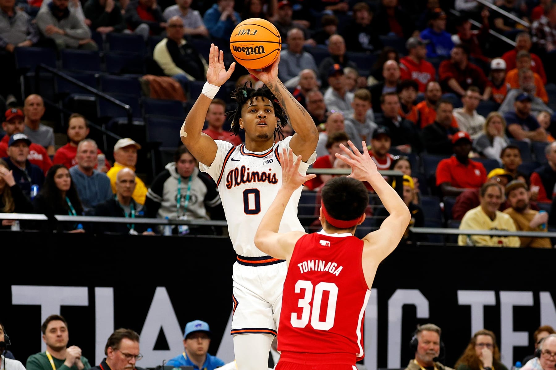 MINNEAPOLIS, MINNESOTA - MARCH 16: Terrence Shannon Jr. #0 of the Illinois Fighting Illini shoots the ball over Keisei Tominaga #30 of the Nebraska Cornhuskers in the first half at Target Center in the Semifinals of the Big Ten Tournament on March 16, 2024 in Minneapolis, Minnesota. (Photo by David Berding/Getty Images)