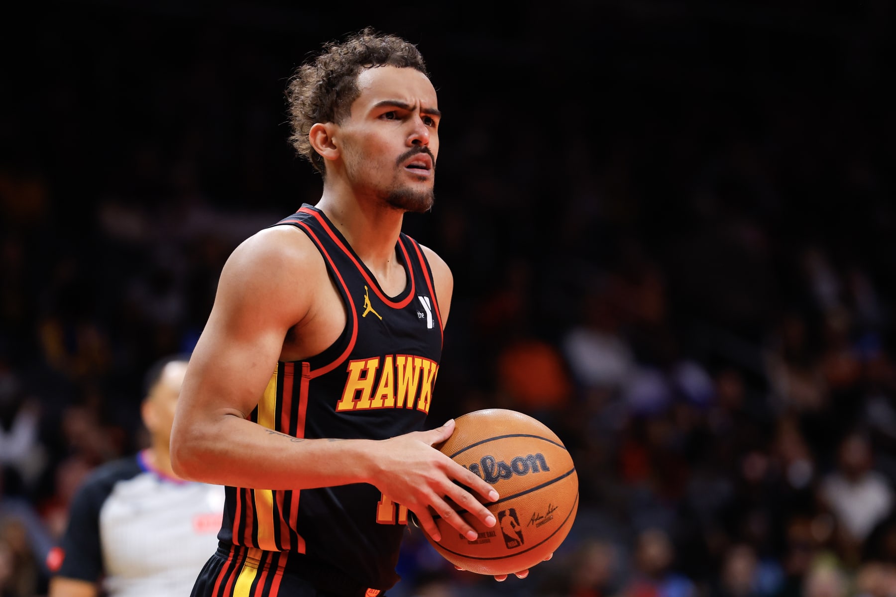 ATLANTA, GEORGIA - FEBRUARY 23: Trae Young #11 of the Atlanta Hawks reacts during the fourth quarter against the Toronto Raptors at State Farm Arena on February 23, 2024 in Atlanta, Georgia. NOTE TO USER: User expressly acknowledges and agrees that, by downloading and or using this photograph, User is consenting to the terms and conditions of the Getty Images License Agreement. (Photo by Todd Kirkland/Getty Images)