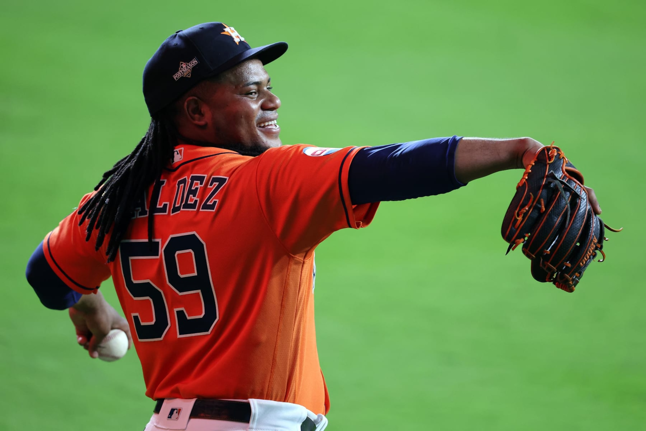 HOUSTON, TEXAS - OCTOBER 22: Framber Valdez #59 of the Houston Astros warms up prior to Game Six of the American League Championship Series against the Texas Rangers at Minute Maid Park on October 22, 2023 in Houston, Texas. (Photo by Rob Carr/Getty Images)