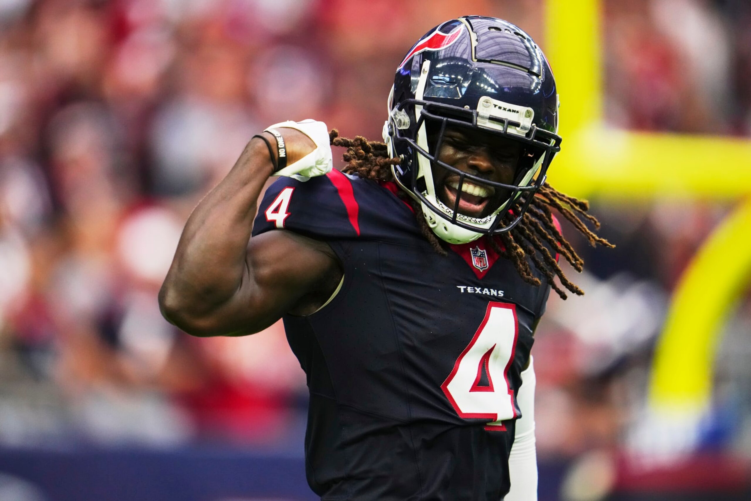 HOUSTON, TX - NOVEMBER 05: Tavierre Thomas #4 of the Houston Texans celebrates after a play against the Tampa Bay Buccaneers during the second half at NRG Stadium on November 5, 2023 in Houston, Texas. (Photo by Cooper Neill/Getty Images)