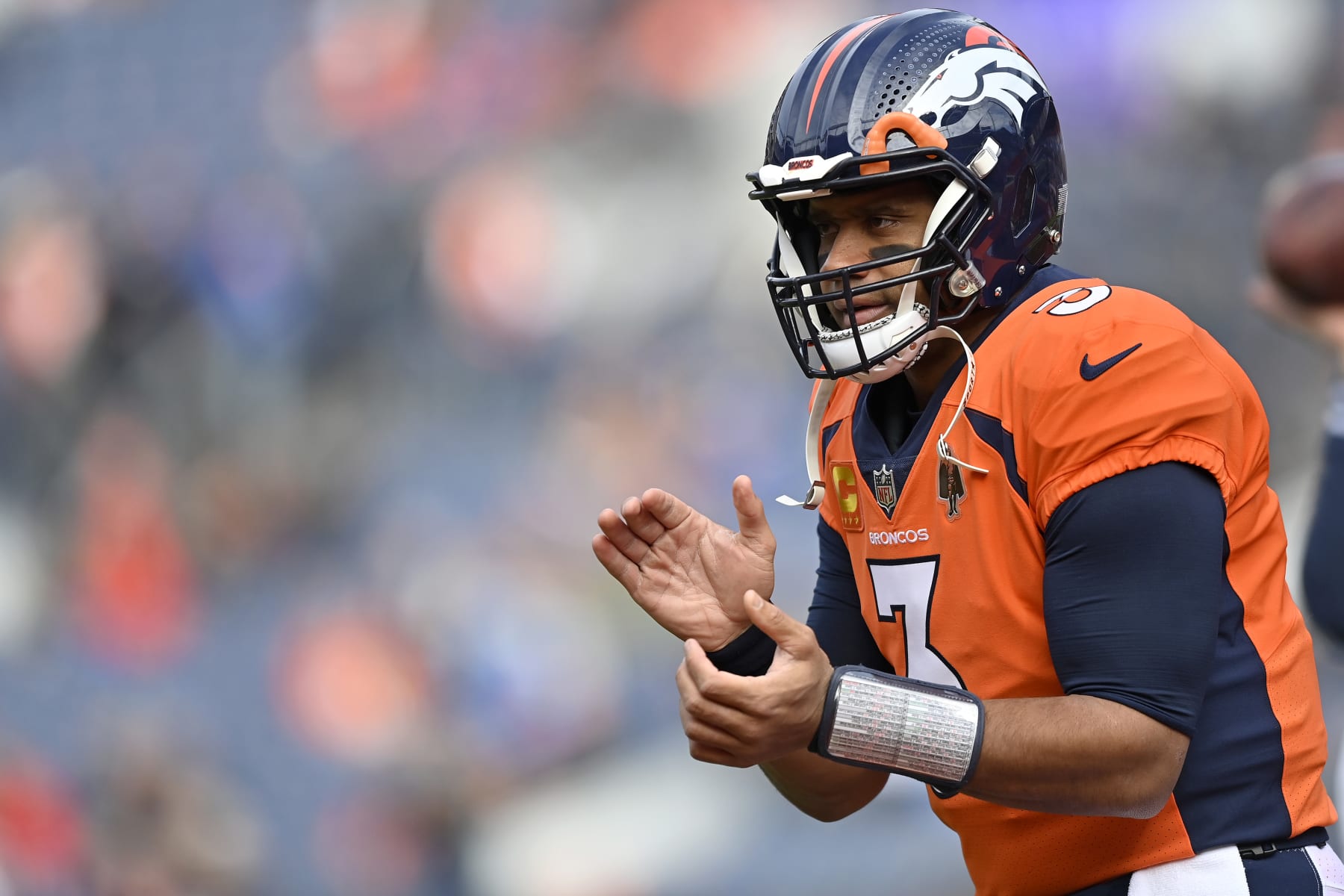 DENVER, COLORADO - DECEMBER 31: Russell Wilson #3 of the Denver Broncos warms up prior to a game against the Los Angeles Chargers at Empower Field At Mile High on December 31, 2023 in Denver, Colorado. (Photo by Dustin Bradford/Getty Images)