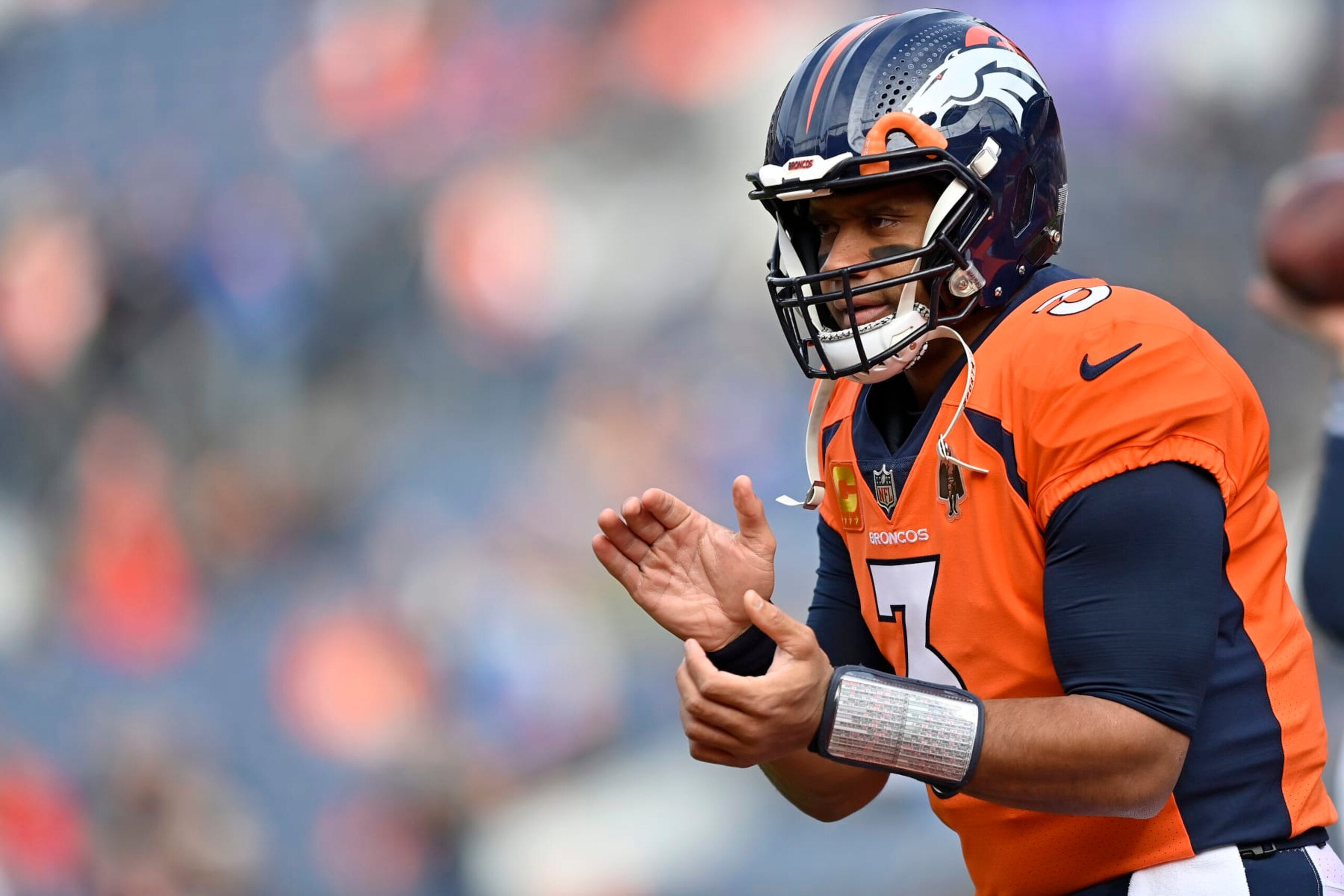 DENVER, COLORADO - DECEMBER 31: Russell Wilson #3 of the Denver Broncos warms up prior to a game against the Los Angeles Chargers at Empower Field At Mile High on December 31, 2023 in Denver, Colorado. (Photo by Dustin Bradford/Getty Images)