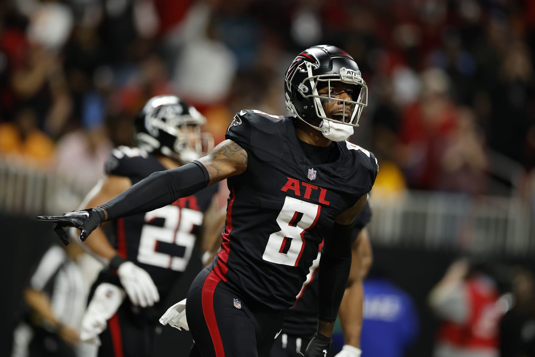 ATLANTA, GEORGIA - DECEMBER 10: Kyle Pitts #8 of the Atlanta Falcons reacts after scoring a touchdown during the first half of a against the Tampa Bay Buccaneers at Mercedes-Benz Stadium on December 10, 2023 in Atlanta, Georgia. (Photo by Alex Slitz/Getty Images)