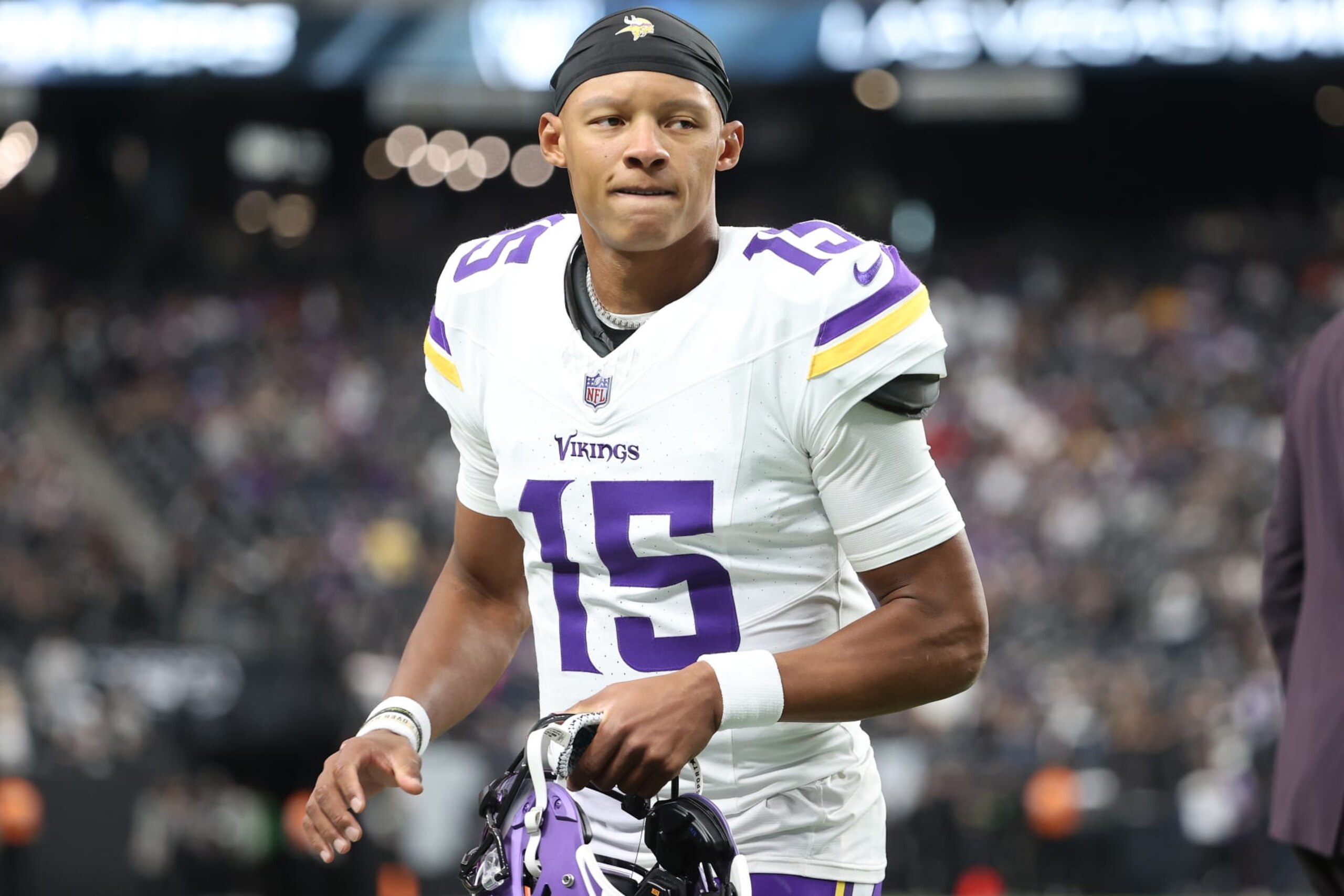 LAS VEGAS, NEVADA - DECEMBER 10: Joshua Dobbs #15 of the Minnesota Vikings warms up before the game against the Las Vegas Raiders at Allegiant Stadium on December 10, 2023 in Las Vegas, Nevada. (Photo by Ian Maule/Getty Images)