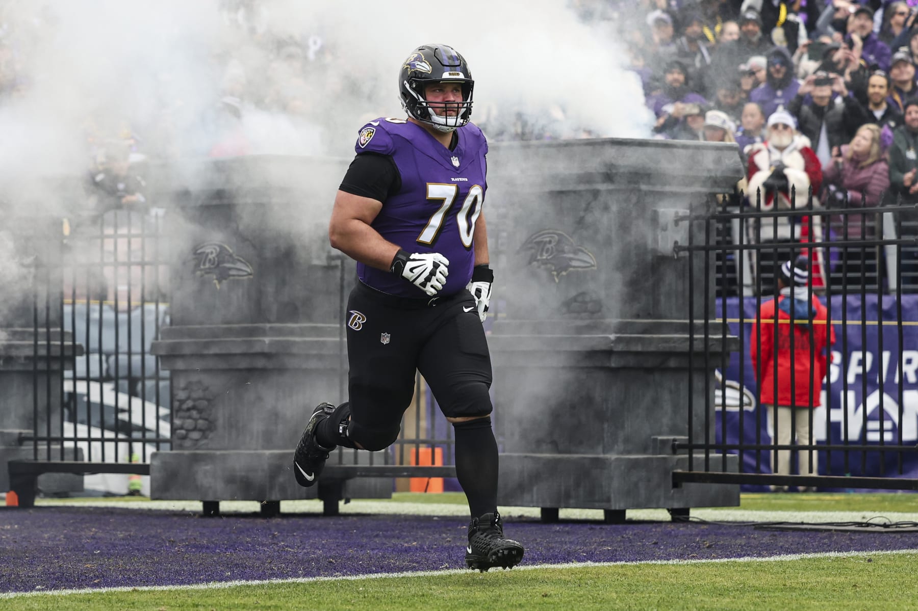 BALTIMORE, MD - JANUARY 28: Kevin Zeitler #70 of the Baltimore Ravens runs out of the tunnel prior to the AFC Championship NFL football game against the Kansas City Chiefs at M&T Bank Stadium on January 28, 2024 in Baltimore, Maryland. (Photo by Perry Knotts/Getty Images) BALTIMORE, MD - JANUARY 28: Kevin Zeitler #70 of the Baltimore Ravens runs out of the tunnel prior to the AFC Championship NFL football game against the Kansas City Chiefs at M&T Bank Stadium on January 28, 2024 in Baltimore, Maryland. (Photo by Perry Knotts/Getty Images)