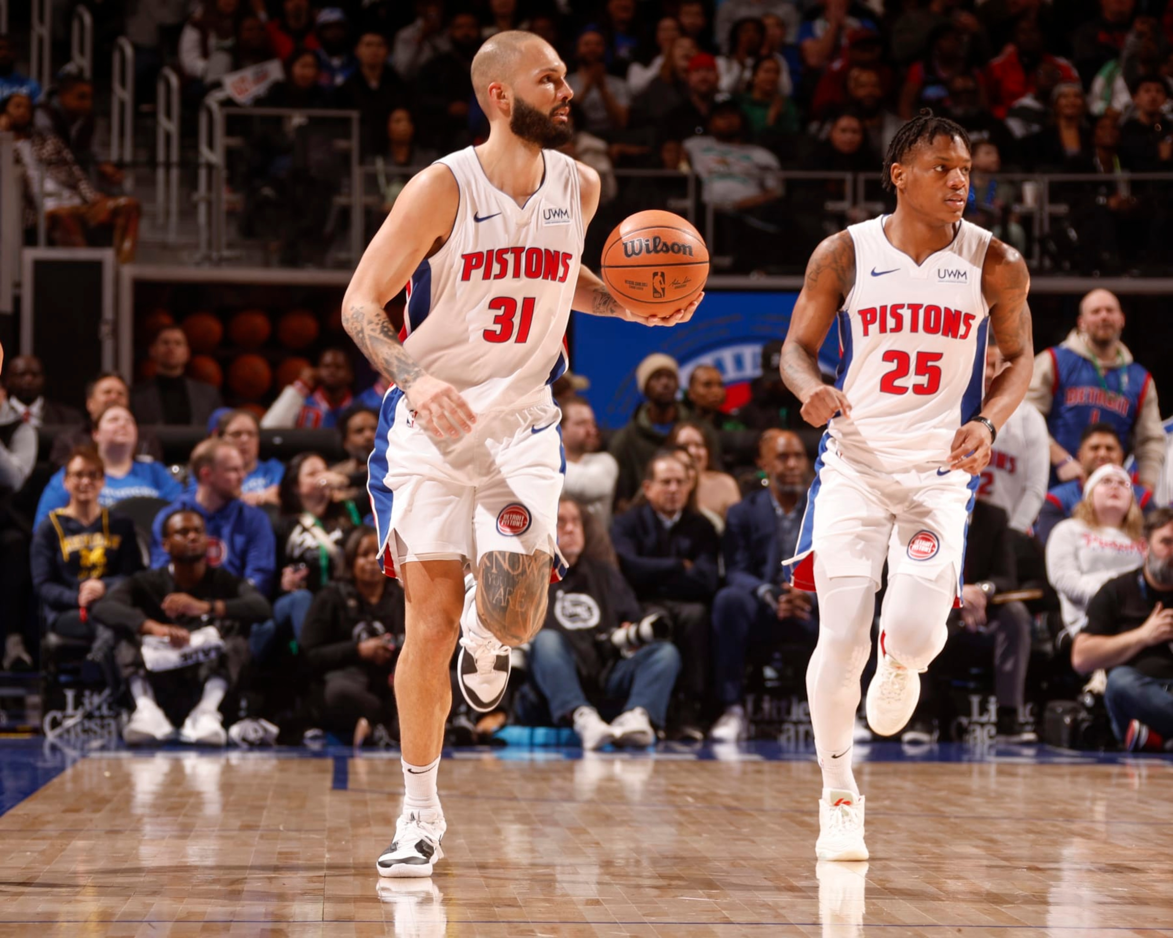 DETROIT, MI - MARCH 17: Evan Fournier #31 of the Detroit Pistons handles the ball during the game on March 17, 2024 at Little Caesars Arena in Detroit, Michigan. NOTE TO USER: User expressly acknowledges and agrees that, by downloading and/or using this photograph, User is consenting to the terms and conditions of the Getty Images License Agreement. Mandatory Copyright Notice: Copyright 2024 NBAE (Photo by Brian Sevald/NBAE via Getty Images) DETROIT, MI - MARCH 17: Evan Fournier #31 of the Detroit Pistons handles the ball during the game on March 17, 2024 at Little Caesars Arena in Detroit, Michigan. NOTE TO USER: User expressly acknowledges and agrees that, by downloading and/or using this photograph, User is consenting to the terms and conditions of the Getty Images License Agreement. Mandatory Copyright Notice: Copyright 2024 NBAE (Photo by Brian Sevald/NBAE via Getty Images)