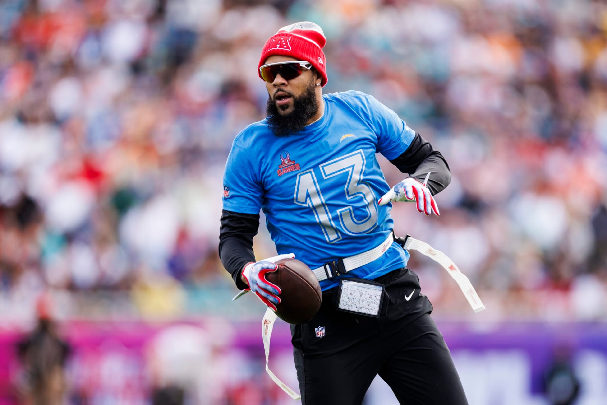 ORLANDO, FLORIDA - FEBRUARY 04: Keenan Allen #13 of the Los Angeles Chargers and AFC runs with the ball after catching a pass during the 2024 NFL Pro Bowl at Camping World Stadium on February 04, 2024 in Orlando, Florida. (Photo by James Gilbert/Getty Images)
