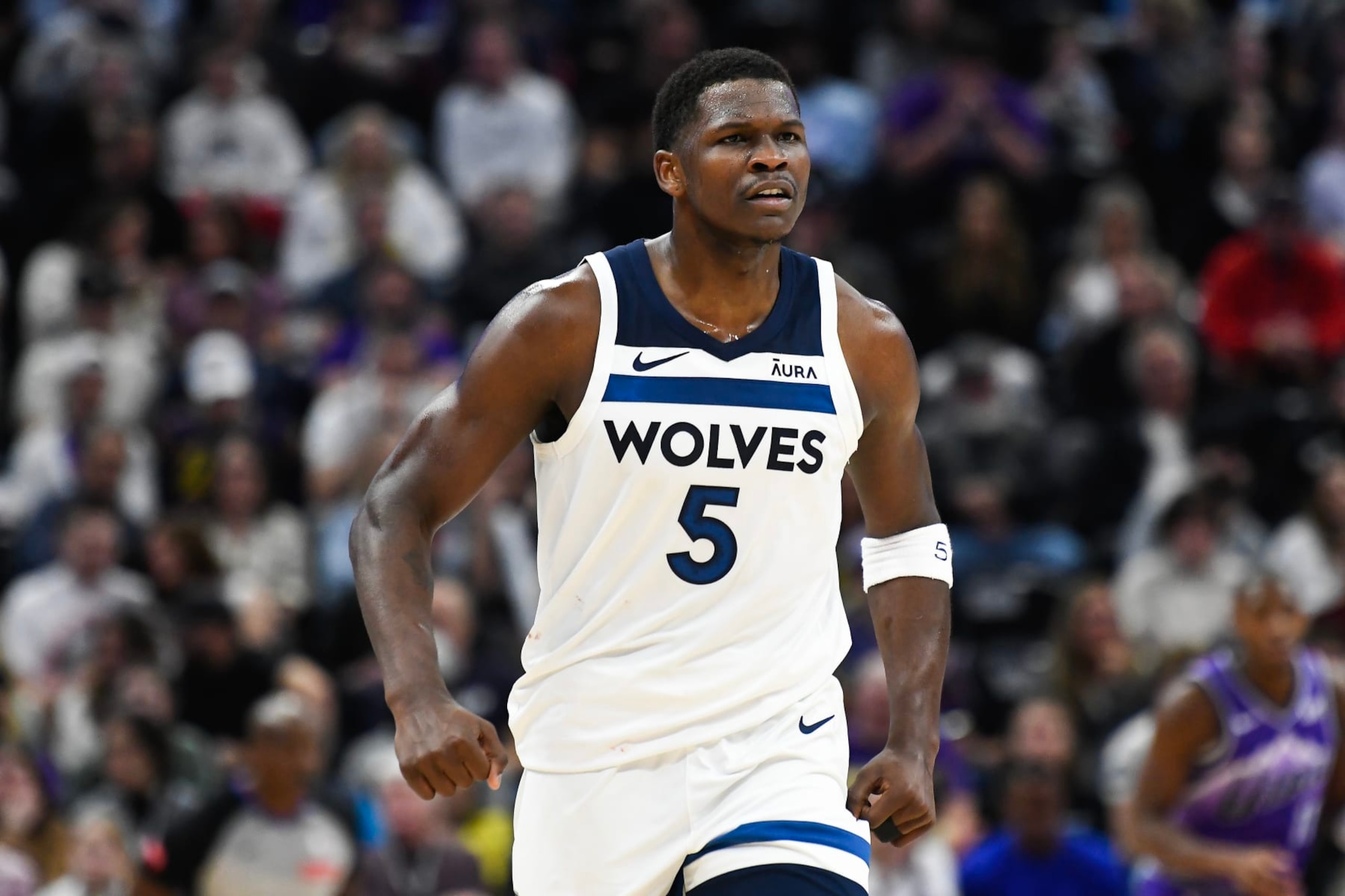 SALT LAKE CITY, UTAH - MARCH 18: Anthony Edwards #5 of the Minnesota Timberwolves celebrates a play during the second half of a game against the Utah Jazz at Delta Center on March 18, 2024 in Salt Lake City, Utah. NOTE TO USER: User expressly acknowledges and agrees that, by downloading and or using this photograph, User is consenting to the terms and conditions of the Getty Images License Agreement.  (Photo by Alex Goodlett/Getty Images)