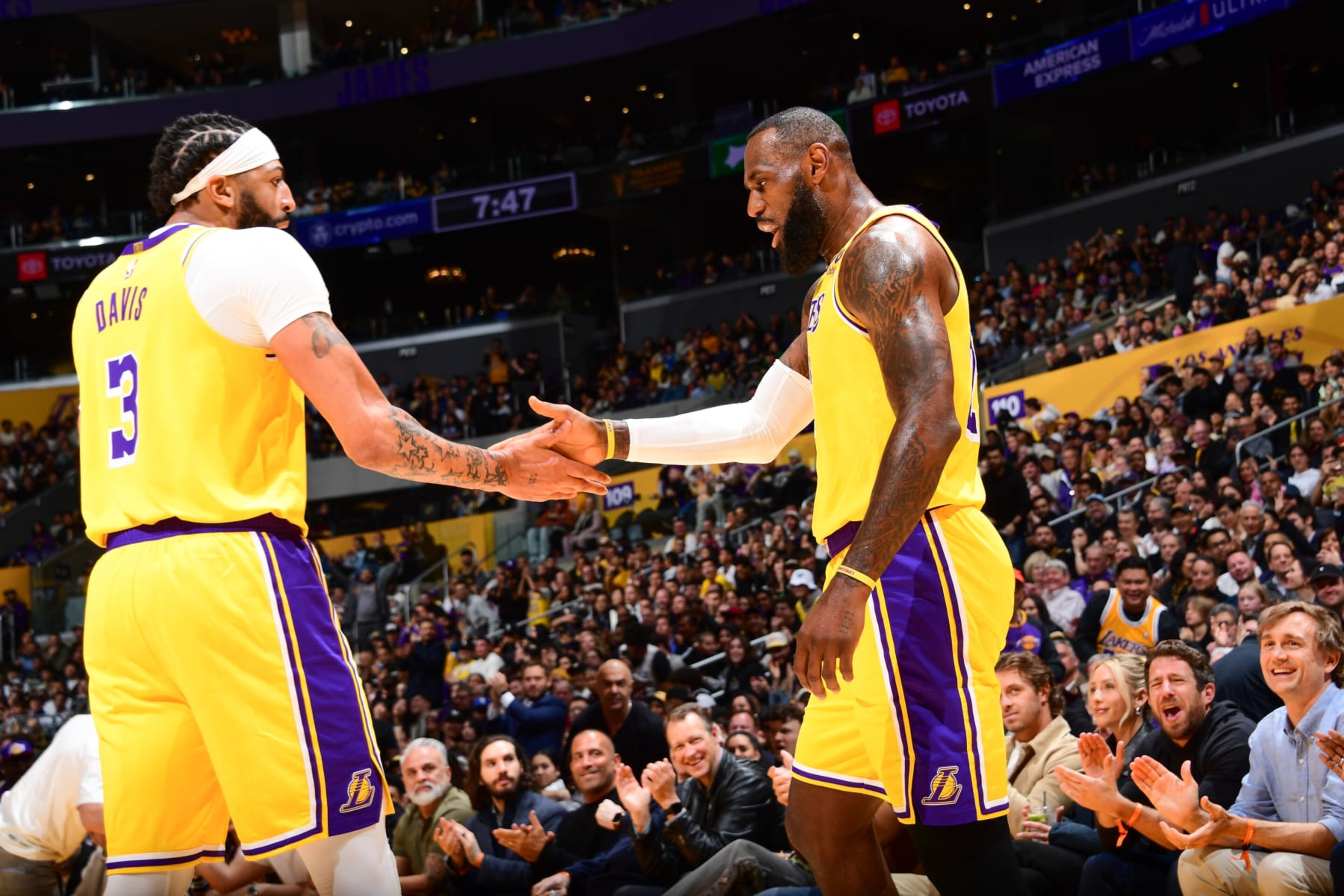 LOS ANGELES, CA - MARCH 18: Anthony Davis #3 of the Los Angeles Lakers & LeBron James #23 of the Los Angeles Lakers high five during the game on March 18, 2024 at Crypto.Com Arena in Los Angeles, California. NOTE TO USER: User expressly acknowledges and agrees that, by downloading and/or using this Photograph, user is consenting to the terms and conditions of the Getty Images License Agreement. Mandatory Copyright Notice: Copyright 2024 NBAE (Photo by Adam Pantozzi/NBAE via Getty Images) LOS ANGELES, CA - MARCH 18: Anthony Davis #3 of the Los Angeles Lakers & LeBron James #23 of the Los Angeles Lakers high five during the game on March 18, 2024 at Crypto.Com Arena in Los Angeles, California. NOTE TO USER: User expressly acknowledges and agrees that, by downloading and/or using this Photograph, user is consenting to the terms and conditions of the Getty Images License Agreement. Mandatory Copyright Notice: Copyright 2024 NBAE (Photo by Adam Pantozzi/NBAE via Getty Images)