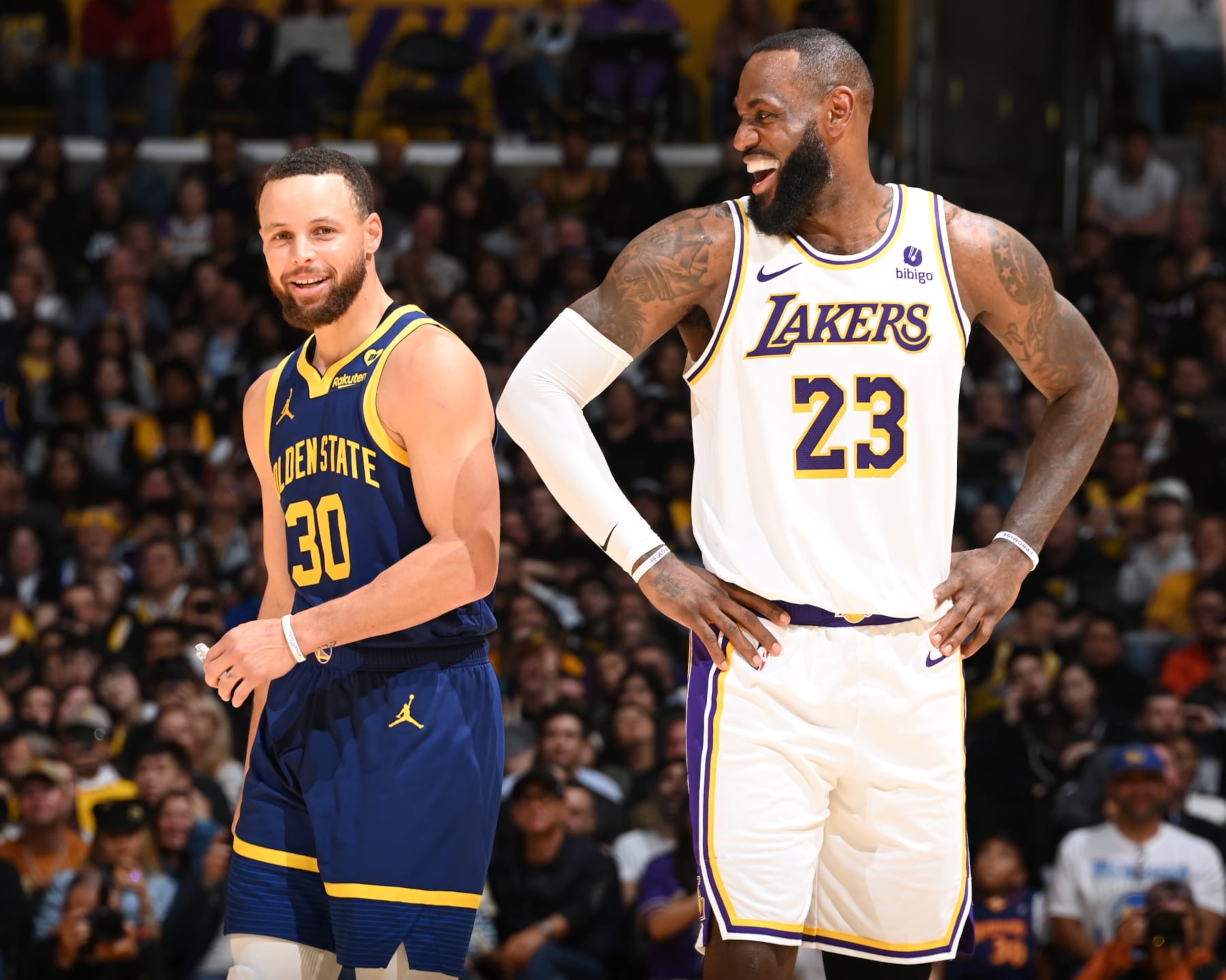 LOS ANGELES, CA - MARCH 16: LeBron James #23 of the Los Angeles Lakers & Stephen Curry #30 of the Golden State Warriors looks on during the game on March 16, 2024 at Crypto.Com Arena in Los Angeles, California. NOTE TO USER: User expressly acknowledges and agrees that, by downloading and/or using this Photograph, user is consenting to the terms and conditions of the Getty Images License Agreement. Mandatory Copyright Notice: Copyright 2024 NBAE (Photo by Andrew D. Bernstein/NBAE via Getty Images) LOS ANGELES, CA - MARCH 16: LeBron James #23 of the Los Angeles Lakers & Stephen Curry #30 of the Golden State Warriors looks on during the game on March 16, 2024 at Crypto.Com Arena in Los Angeles, California. NOTE TO USER: User expressly acknowledges and agrees that, by downloading and/or using this Photograph, user is consenting to the terms and conditions of the Getty Images License Agreement. Mandatory Copyright Notice: Copyright 2024 NBAE (Photo by Andrew D. Bernstein/NBAE via Getty Images)