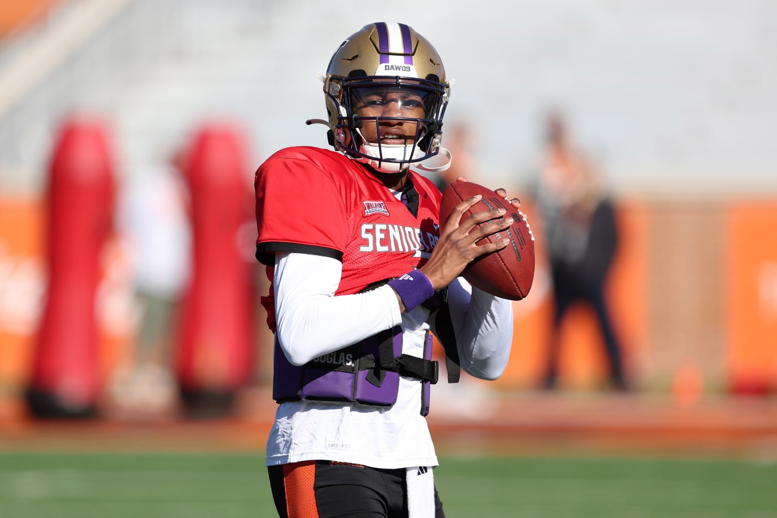 MOBILE, AL - JANUARY 31: National quarterback Michael Penix Jr. of Washington (9) during the National team practice for the Reese's Senior Bowl on January 31, 2024 at Hancock Whitney Stadium in Mobile, Alabama. (Photo by Michael Wade/Icon Sportswire via Getty Images) MOBILE, AL - JANUARY 31: National quarterback Michael Penix Jr. of Washington (9) during the National team practice for the Reese's Senior Bowl on January 31, 2024 at Hancock Whitney Stadium in Mobile, Alabama. (Photo by Michael Wade/Icon Sportswire via Getty Images)
