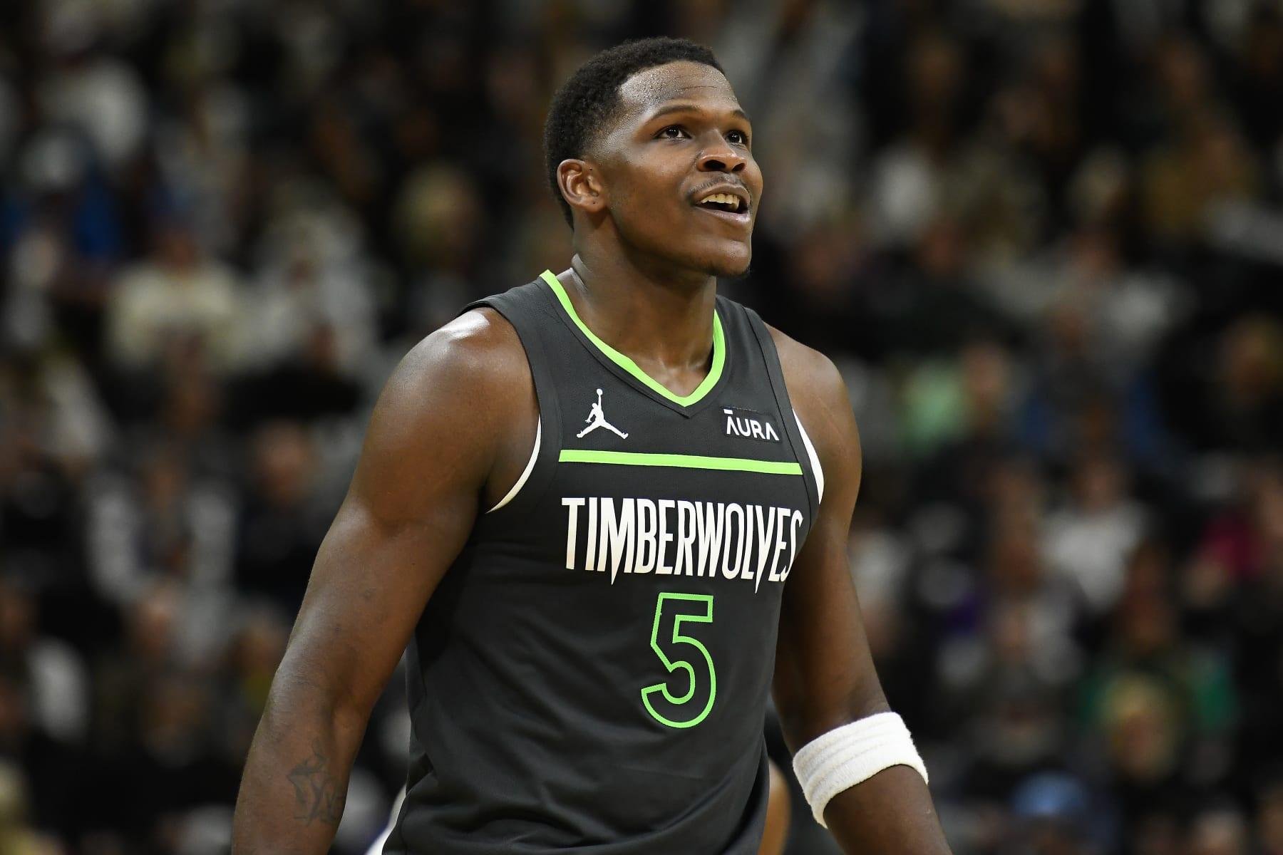 SALT LAKE CITY, UTAH - MARCH 16: Anthony Edwards #5 of the Minnesota Timberwolves looks on during the second half of a game against the Utah Jazz at Delta Center on March 16, 2024 in Salt Lake City, Utah. NOTE TO USER: User expressly acknowledges and agrees that, by downloading and or using this photograph, User is consenting to the terms and conditions of the Getty Images License Agreement.  (Photo by Alex Goodlett/Getty Images)