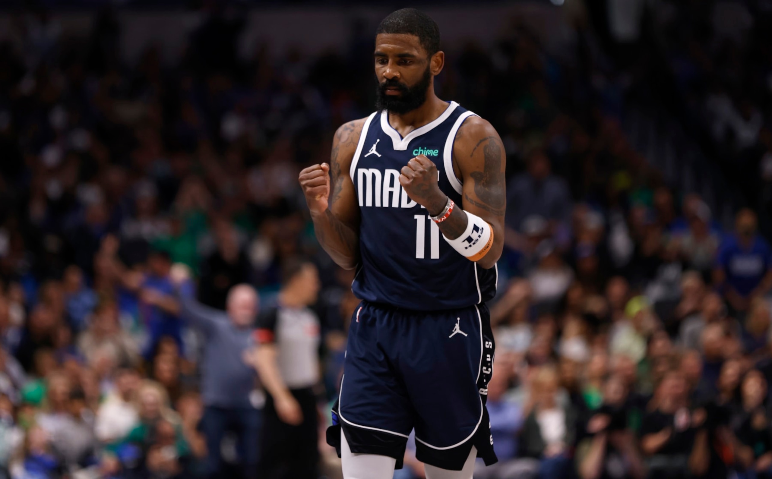 DALLAS, TX - MARCH 17: Kyrie Irving #11 of the Dallas Mavericks reacts late in the game against the Denver Nuggets  in the second half at American Airlines Center on March 17, 2024 in Dallas, Texas. NOTE TO USER: User expressly acknowledges and agrees that, by downloading and or using this photograph, User is consenting to the terms and conditions of the Getty Images License Agreement. (Photo by Ron Jenkins/Getty Images)