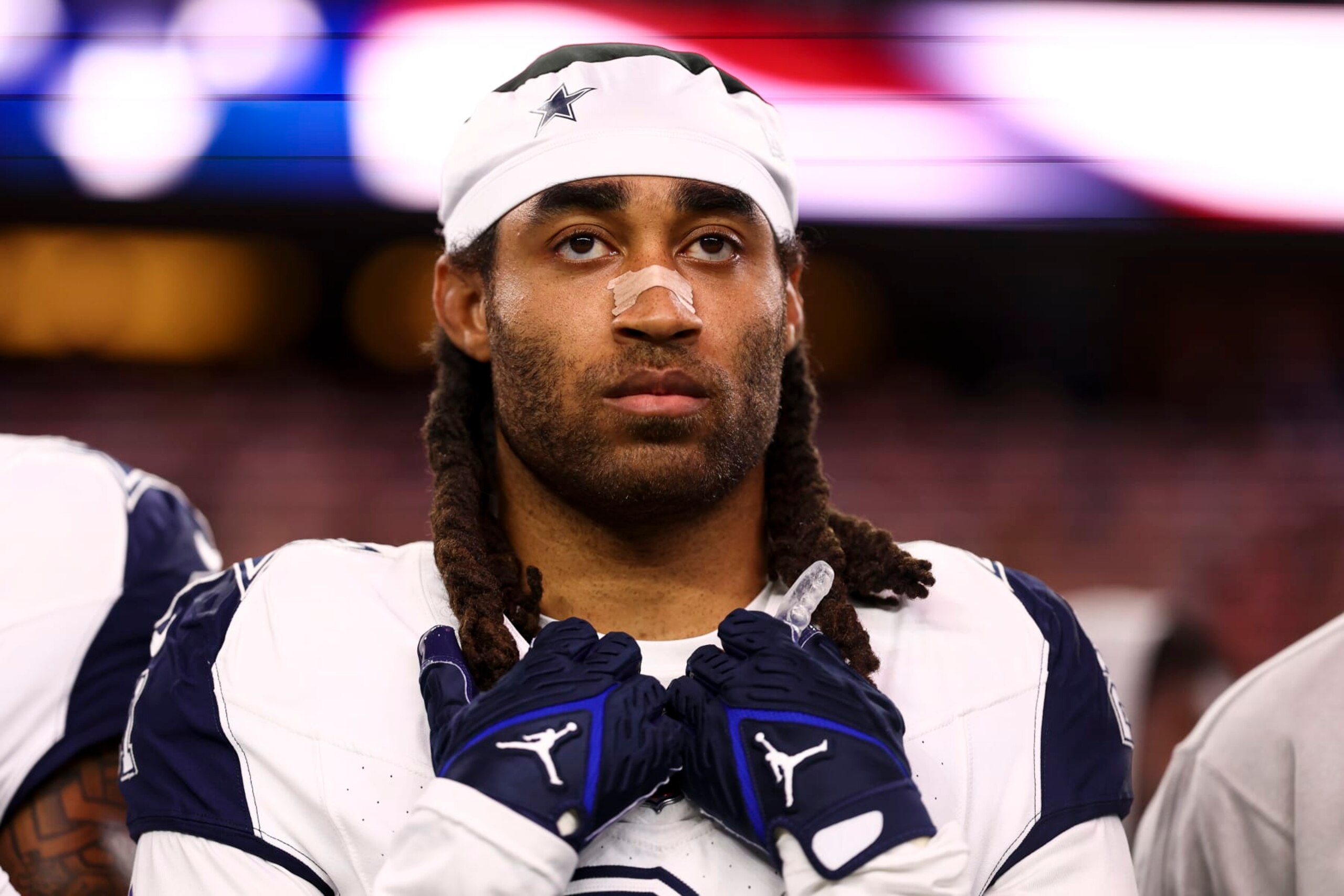 ARLINGTON, TX - DECEMBER 10: Stephon Gilmore #21 of the Dallas Cowboys stands on the sidelines during the national anthem prior to an NFL football game against the Philadelphia Eagles at AT&T Stadium on December 10, 2023 in Arlington, Texas. (Photo by Kevin Sabitus/Getty Images)