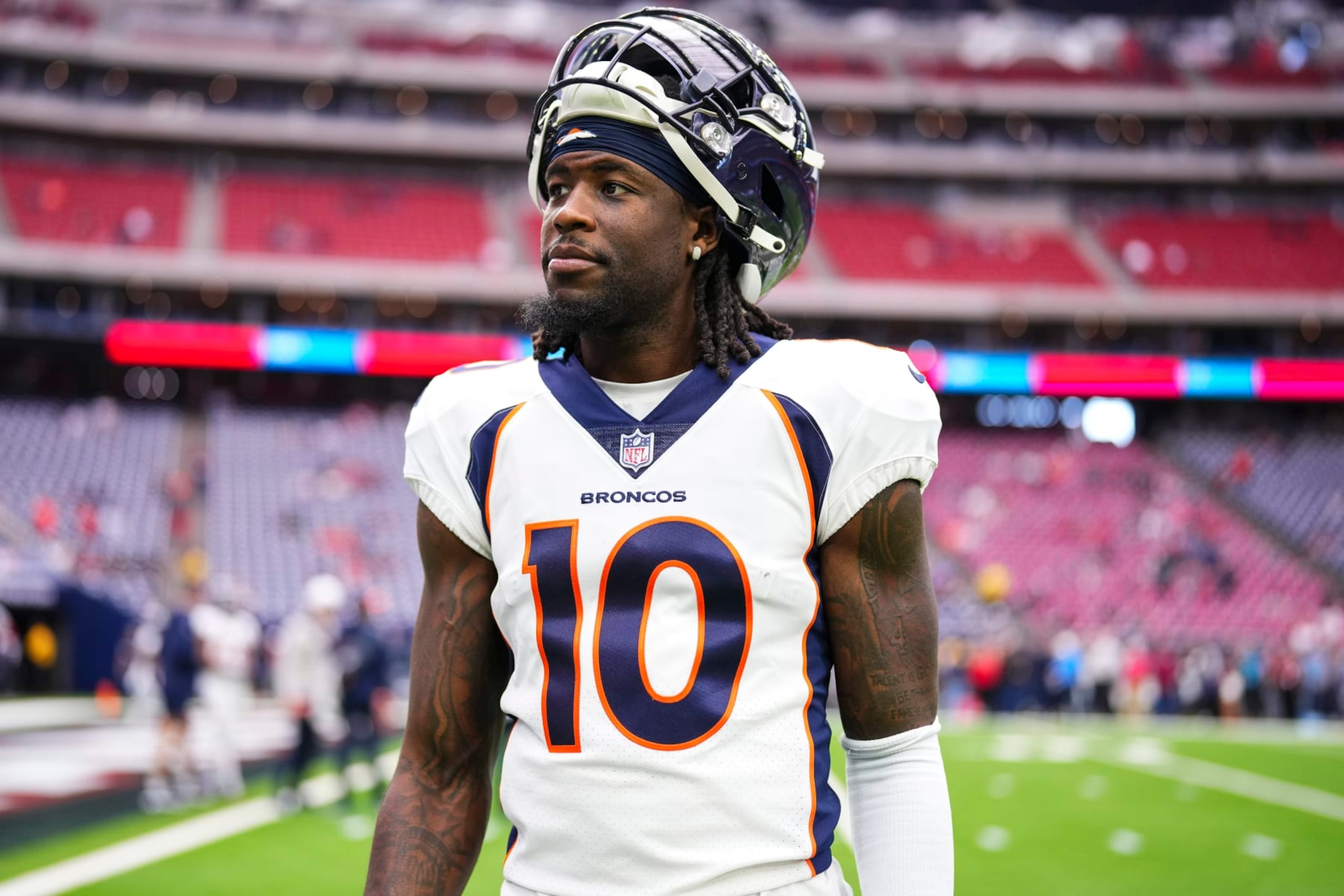 HOUSTON, TX - DECEMBER 03: Jerry Jeudy #10 of the Denver Broncos looks on from the field prior to an NFL football game against the Houston Texans at NRG Stadium on December 3, 2023 in Houston, Texas. (Photo by Cooper Neill/Getty Images) HOUSTON, TX - DECEMBER 03: Jerry Jeudy #10 of the Denver Broncos looks on from the field prior to an NFL football game against the Houston Texans at NRG Stadium on December 3, 2023 in Houston, Texas. (Photo by Cooper Neill/Getty Images)