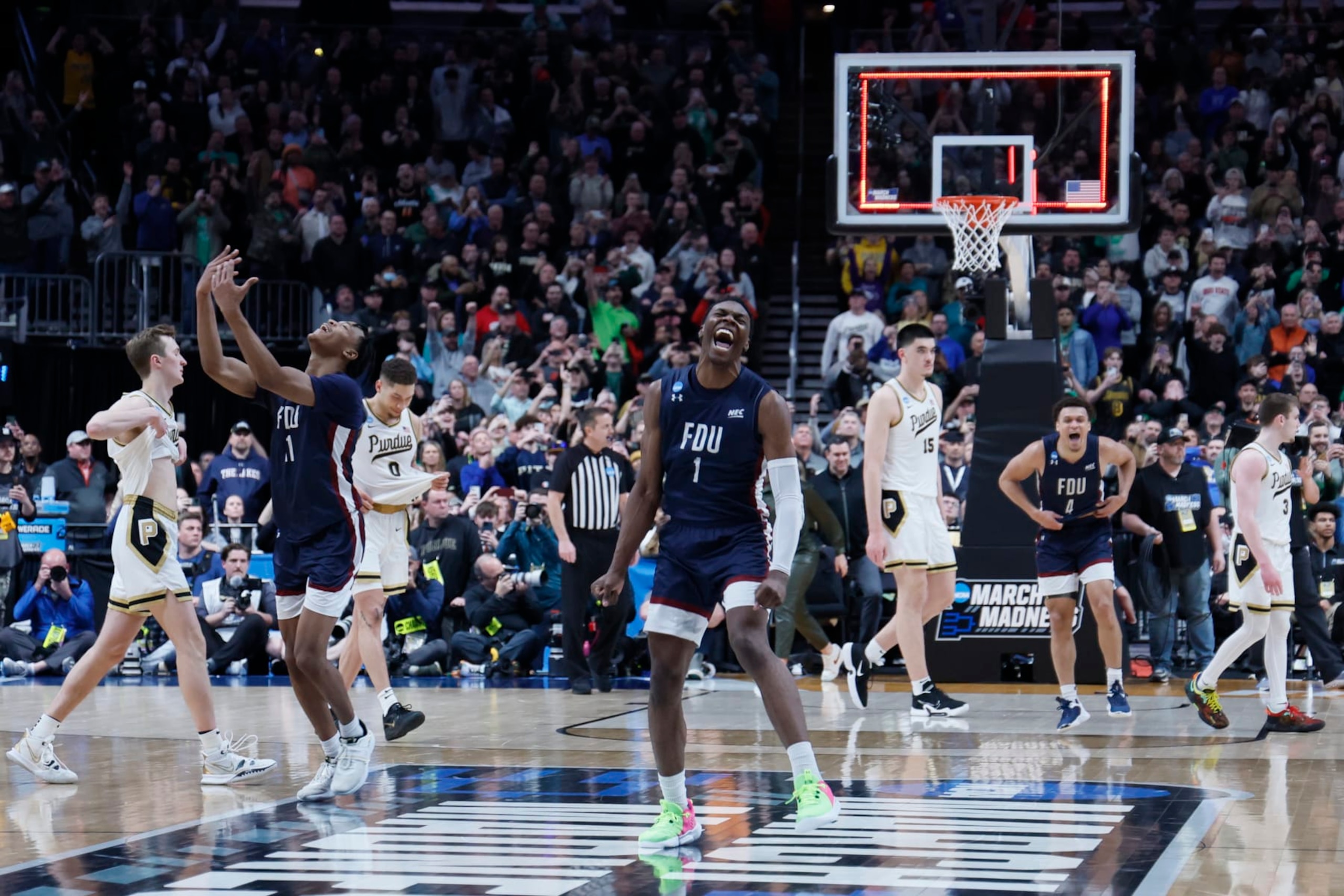 COLUMBUS, OH - MARCH 17: Players from the Fairleigh Dickinson Knights celebrate their win over the Purdue Boilermakers in the first round of the 2023 NCAA Men's Basketball Tournament held at Nationwide Arena on March 17, 2023 in Columbus, Ohio. (Photo by Jay LaPrete/NCAA Photos via Getty Images) COLUMBUS, OH - MARCH 17: Players from the Fairleigh Dickinson Knights celebrate their win over the Purdue Boilermakers in the first round of the 2023 NCAA Men's Basketball Tournament held at Nationwide Arena on March 17, 2023 in Columbus, Ohio. (Photo by Jay LaPrete/NCAA Photos via Getty Images)