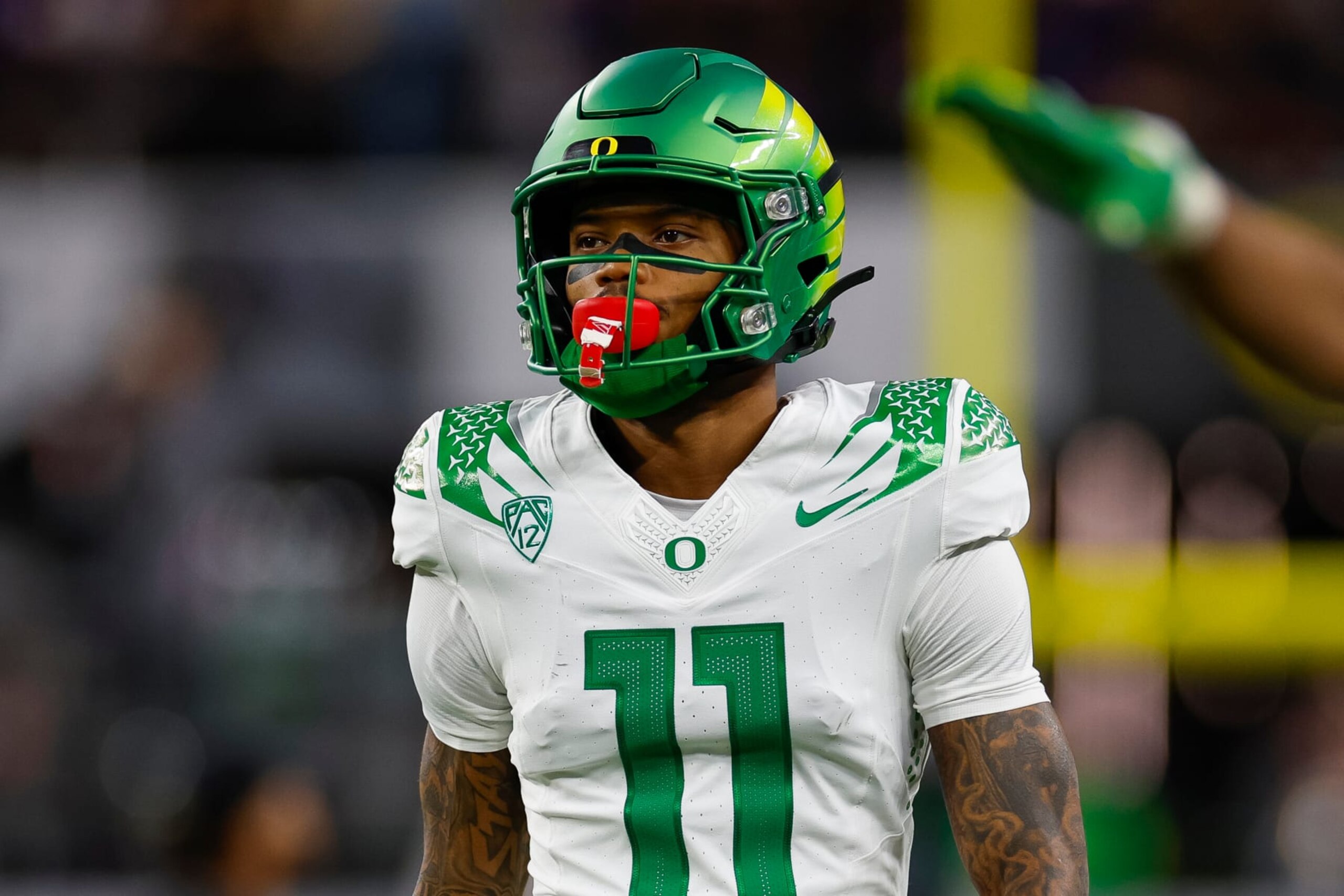 LAS VEGAS, NEVADA - DECEMBER 1: Troy Franklin #11 of the Oregon Ducks warms up prior to the Pac-12 Championship game against the Washington Huskies at Allegiant Stadium on December 1, 2023 in Las Vegas, Nevada. (Photo by Brandon Sloter/Image Of Sport/Getty Images) LAS VEGAS, NEVADA - DECEMBER 1: Troy Franklin #11 of the Oregon Ducks warms up prior to the Pac-12 Championship game against the Washington Huskies at Allegiant Stadium on December 1, 2023 in Las Vegas, Nevada. (Photo by Brandon Sloter/Image Of Sport/Getty Images)