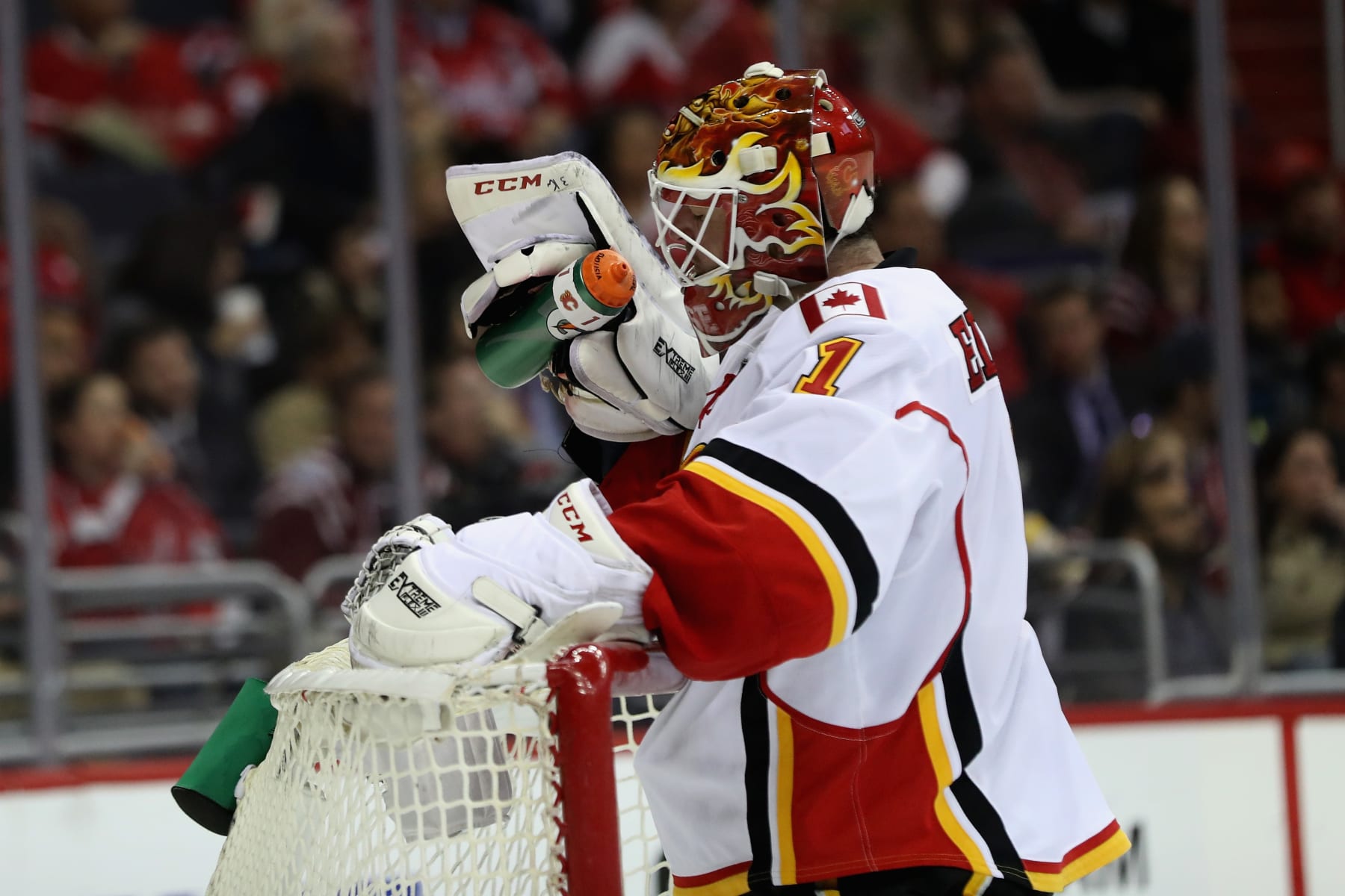 WASHINGTON, DC - MARCH 21: Goalie Brian Elliott #1 of the Calgary Flames gets a drink after giving up a second period goal against the Washington Capitals at Verizon Center on March 21, 2017 in Washington, DC.  (Photo by Rob Carr/Getty Images)